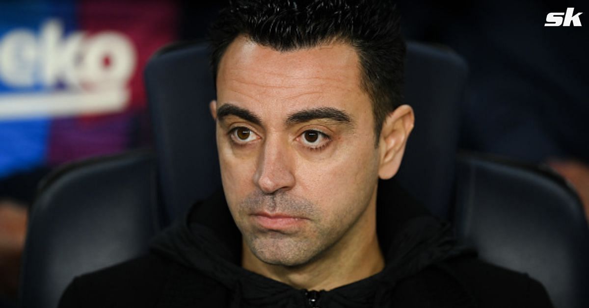 Barcelona manager Xavi Hernandez looks on.
