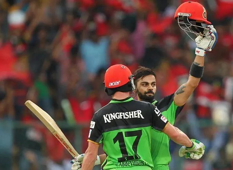 Virat Kohli and AB de Villiers celebrate the former