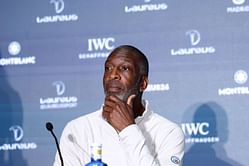 Olympic champion Michael Johnson praises the 'build-up' to Kentucky Derby, wishes the same for track and field