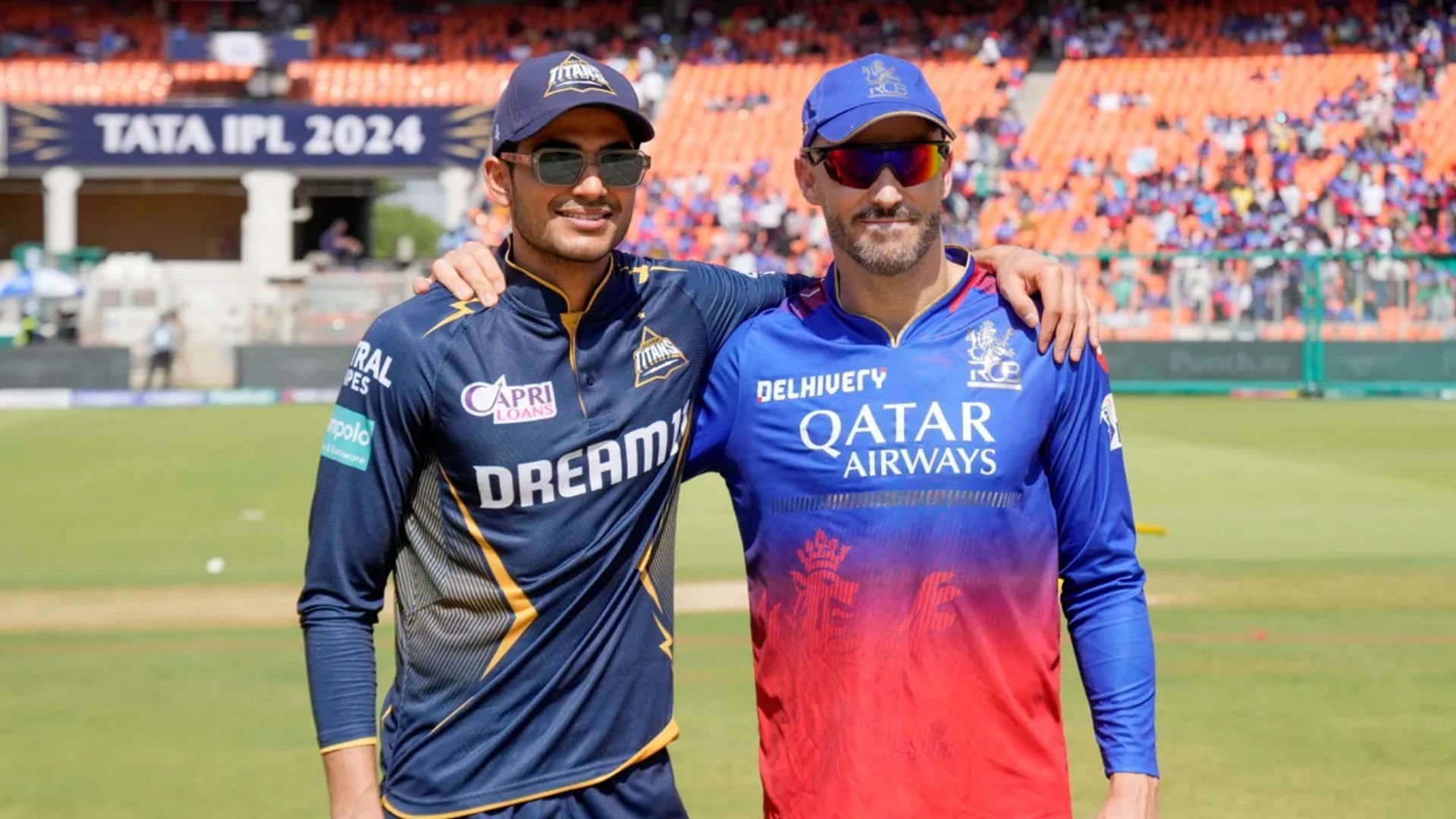 Shubman Gill and Faf du Plessis posing after toss