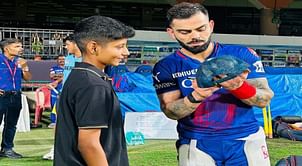 [In Pictures] Virat Kohli meets U19 women’s cricketer, signs her cap ahead of RCB vs GT IPL 2024 match