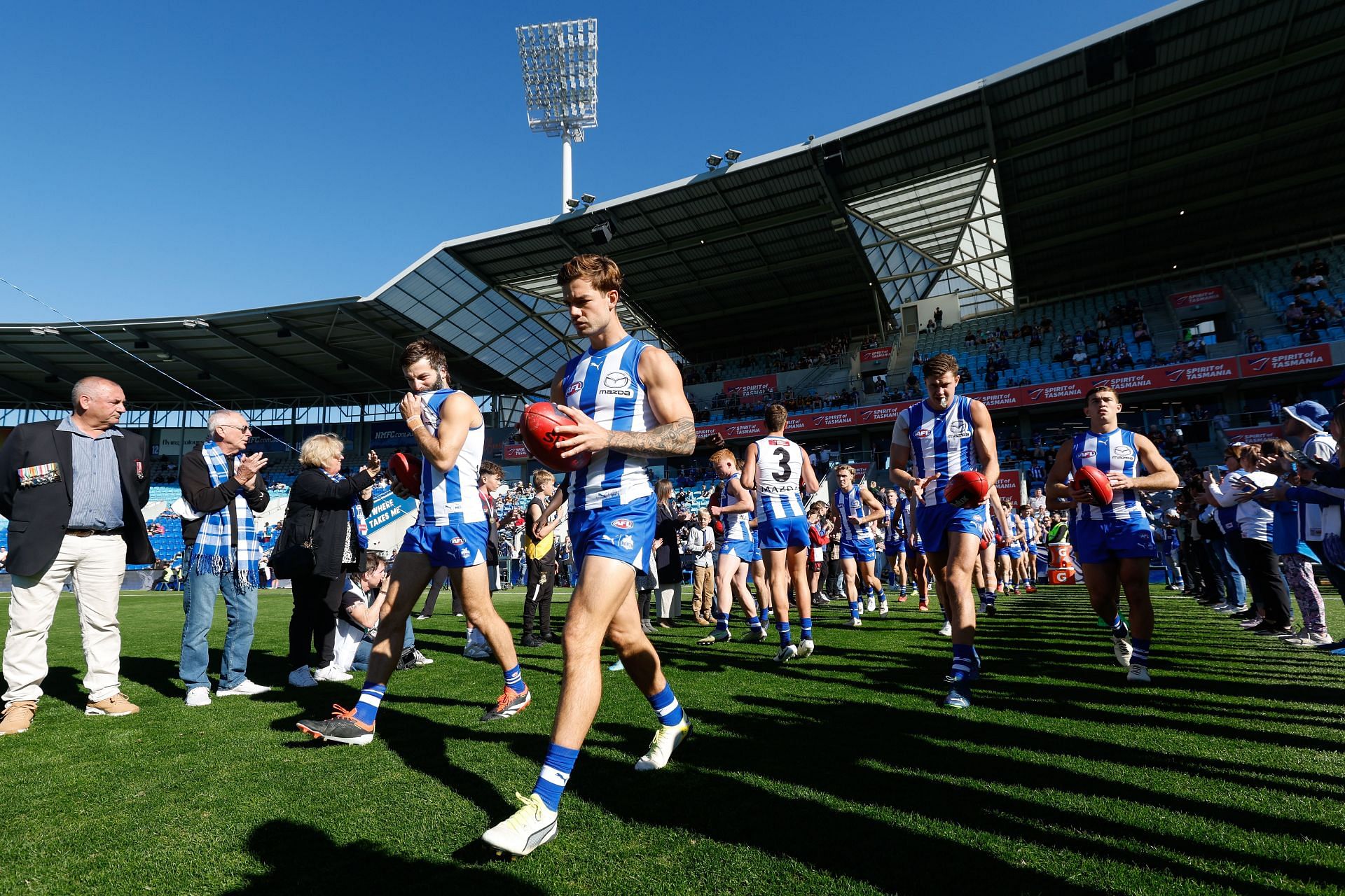 North Melbourne enter the field vs Adelaide