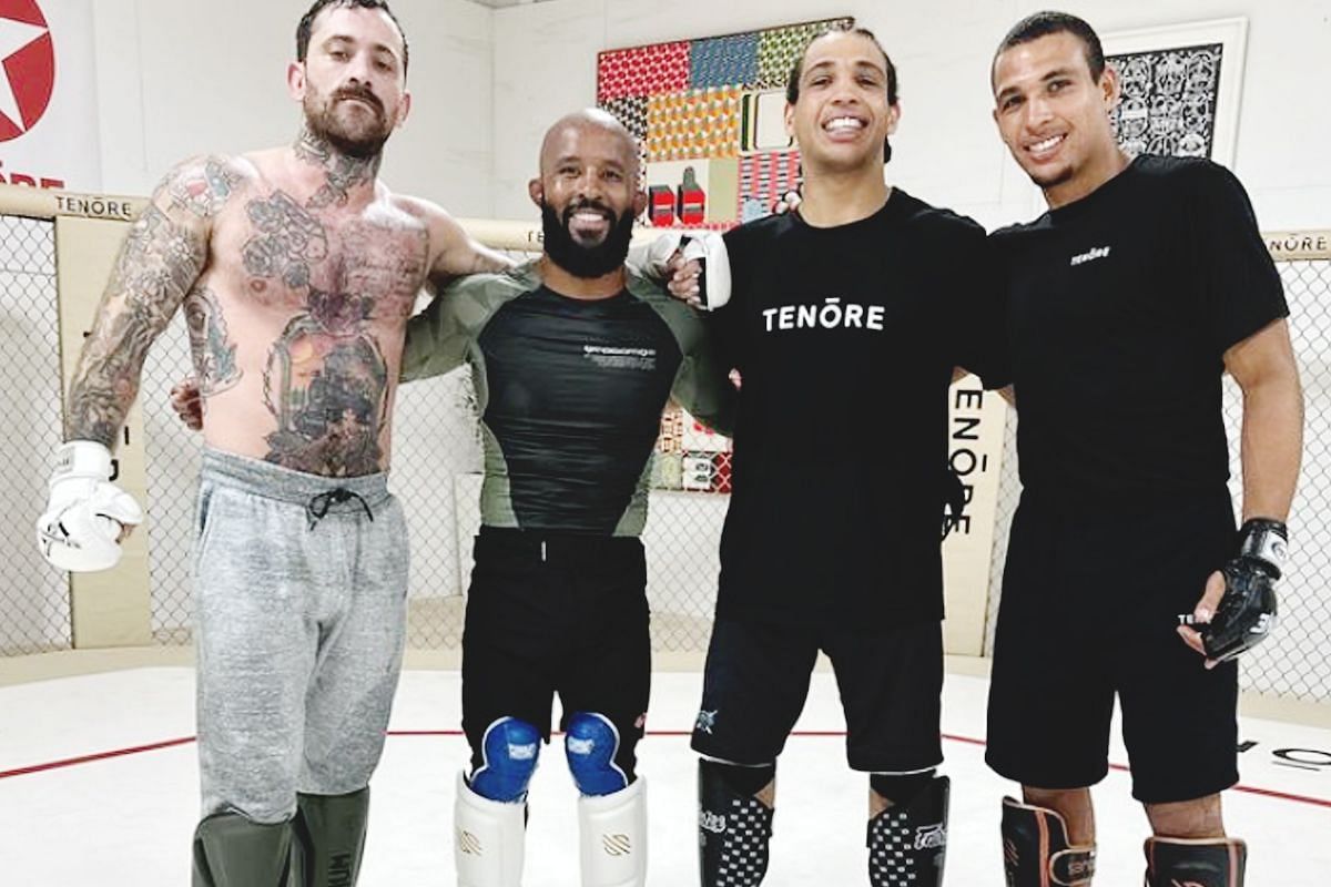 Demetrious Johnson (second from left) trains with Kade (second from right) and Tye Ruotolo (first from right) in California.