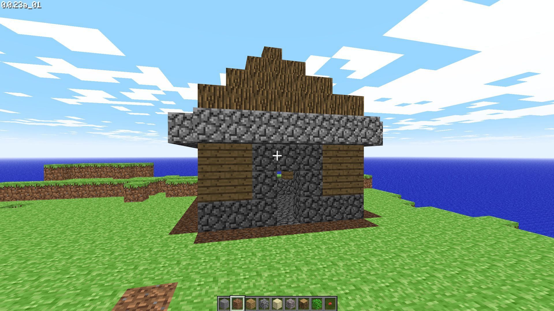 A basic house made in a very different looking Minecraft Alpha version (Image via Mojang)