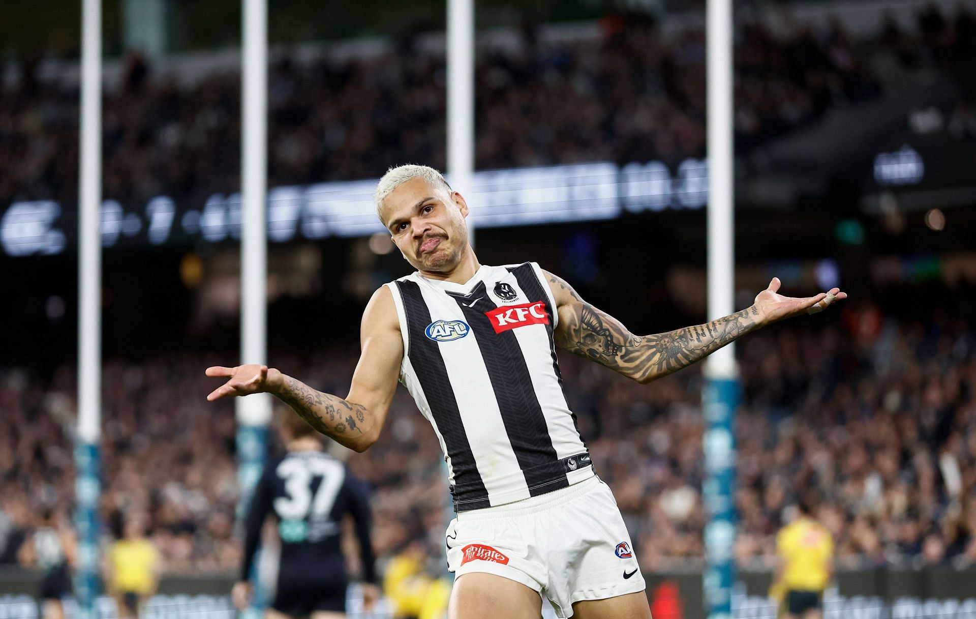 Bobby Hill of the Magpies celebrates a goal during the 2024 AFL round eight match between the Carlton Blues and the Collingwood Magpies