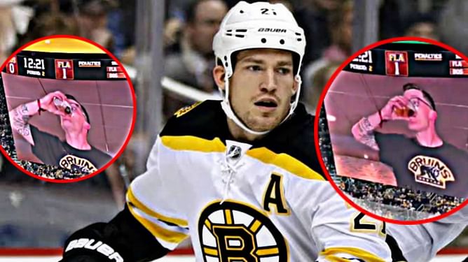 WATCH: Former Bruins star Andrew Ference fires up crowd with epic beer chug in Game 3 against Panthers