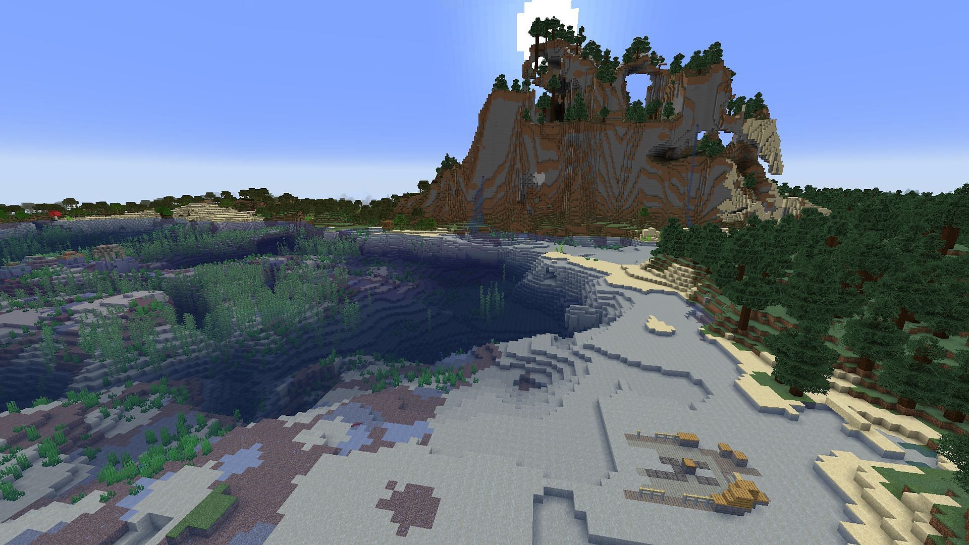 A shipwreck and small ocean ruin found near the seed&#039;s hills (Image via Mojang)