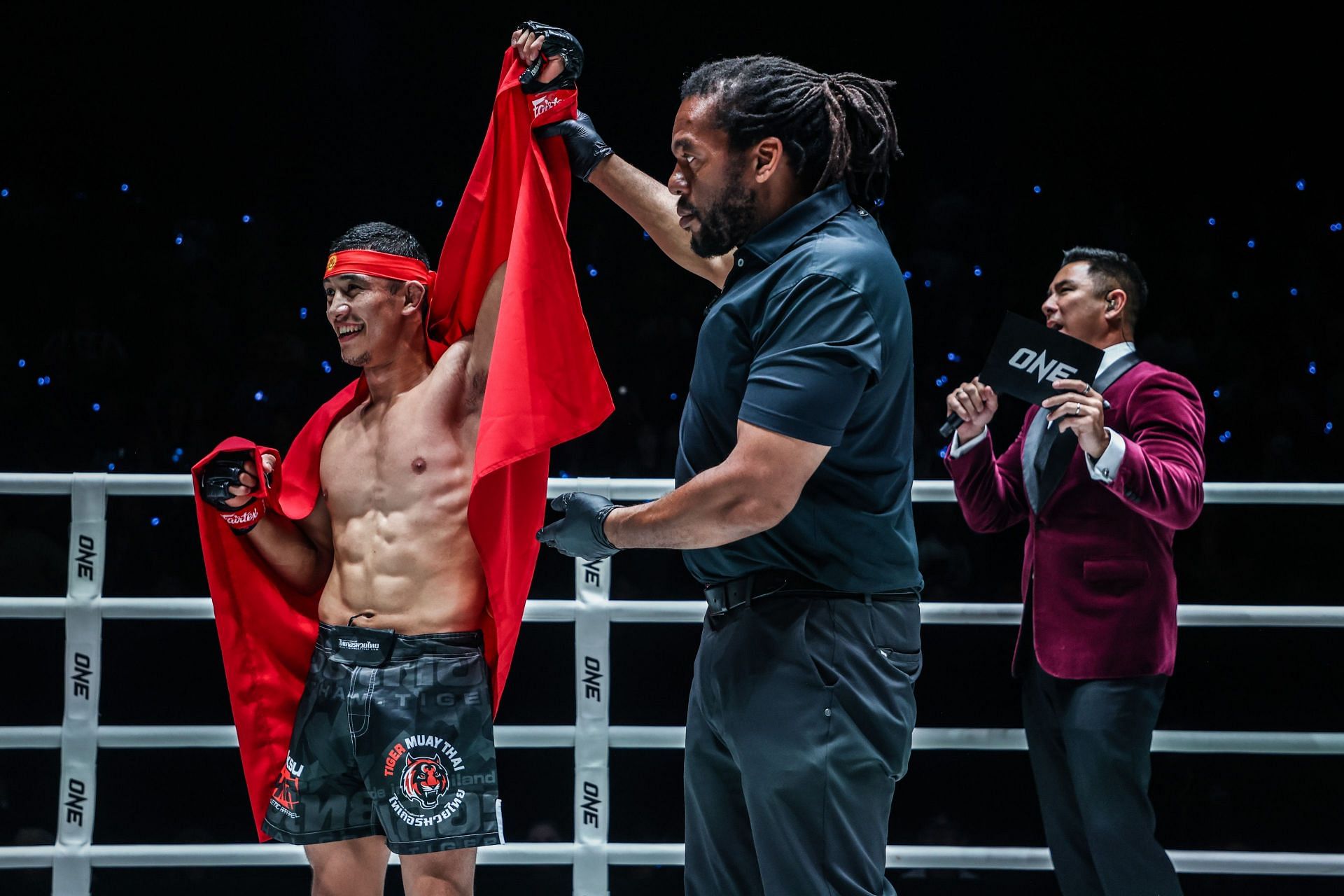 Akbar Abdullaev gets his hand raised by referee Herb Dean.