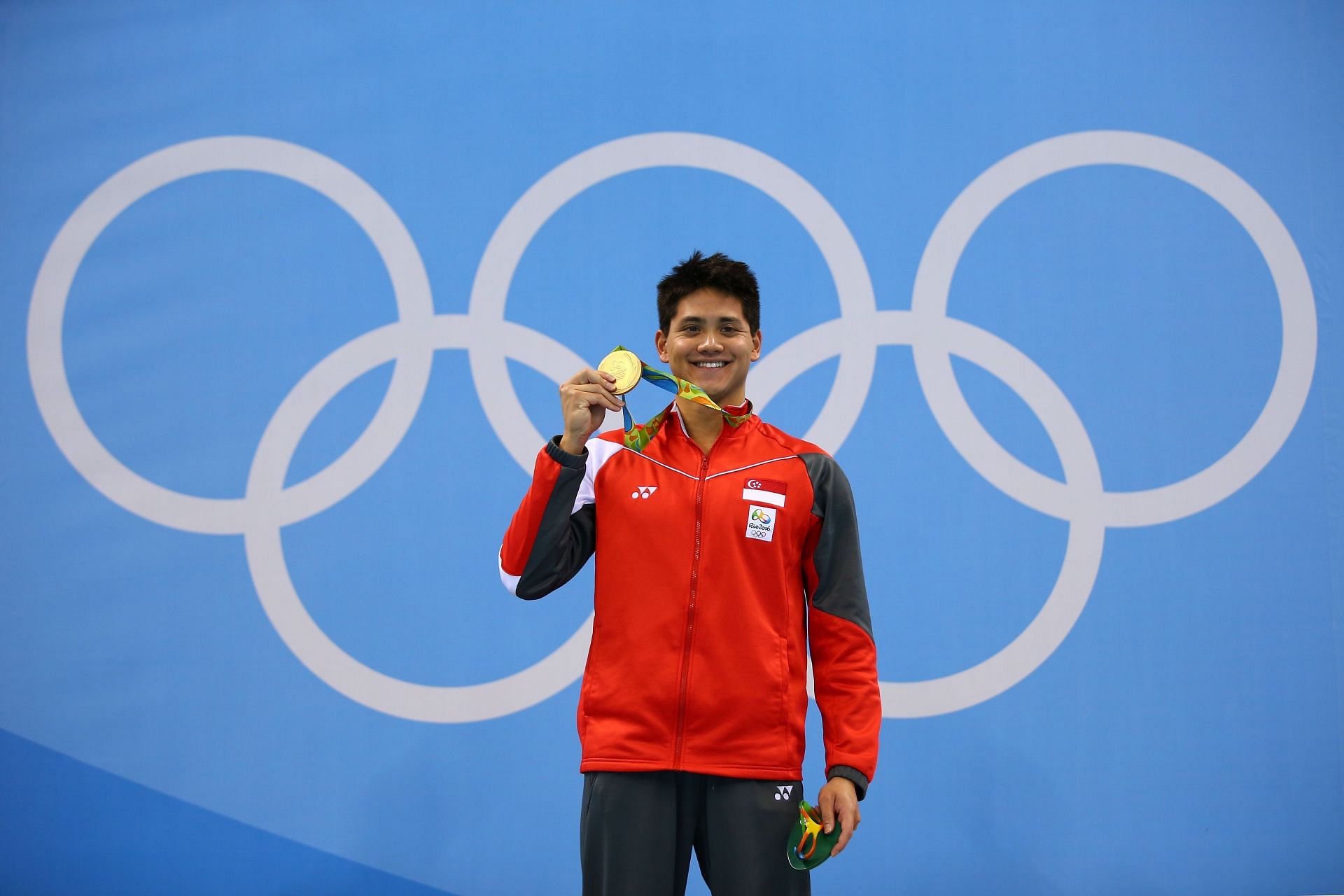 Joseph Schooling celebrates winning the gold medal in the Men&#039;s 100m Butterfly Final at the Rio 2016 Olympic Games. (Photo by Clive Rose/Getty Images)