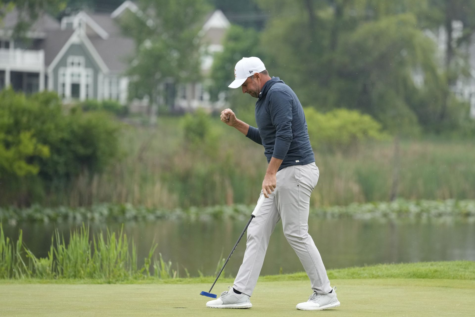 Richard Bland celebrating his win on 18th green (Image via Getty)