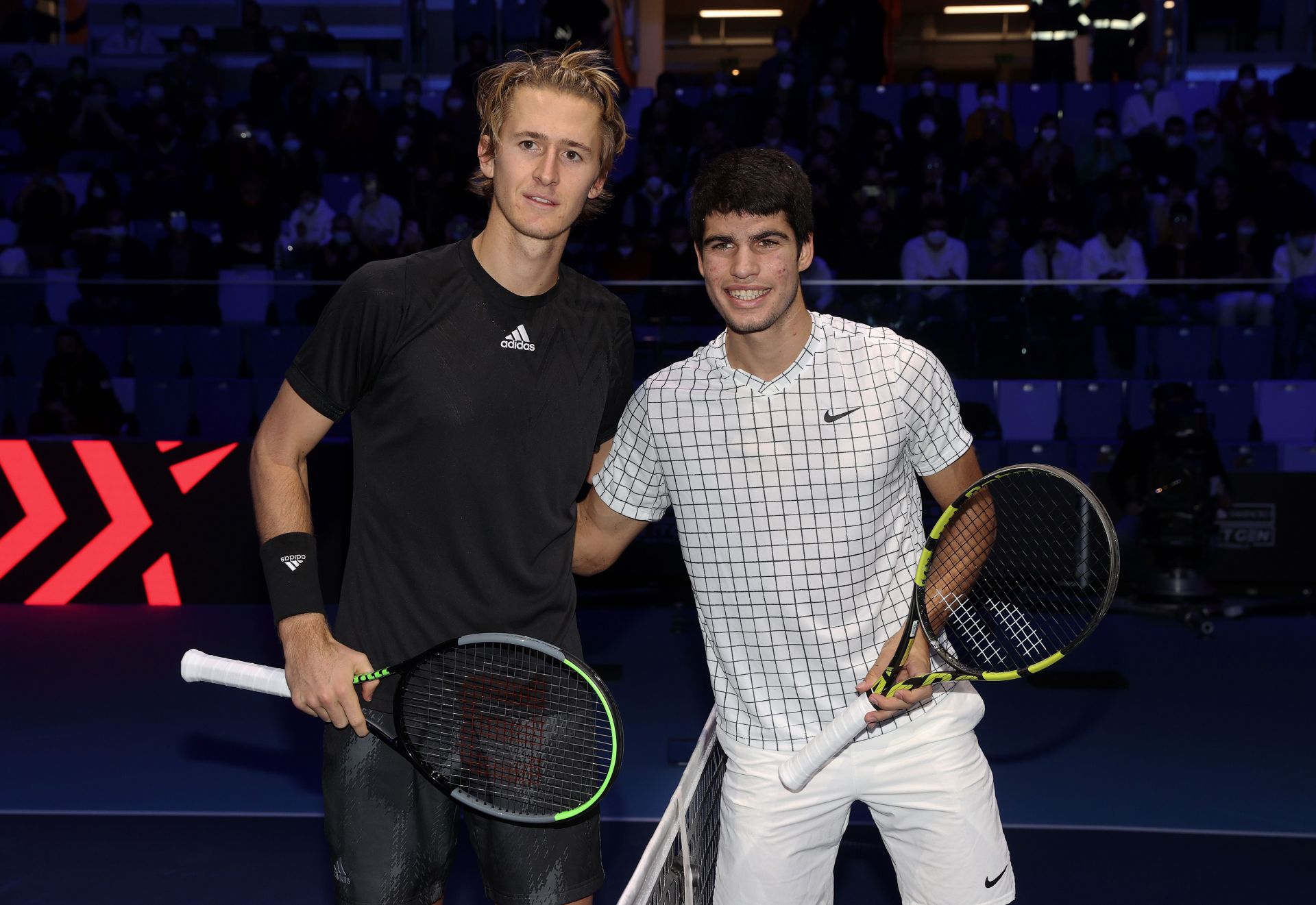 Sebastian Korda (L) and Carlos Alcaraz