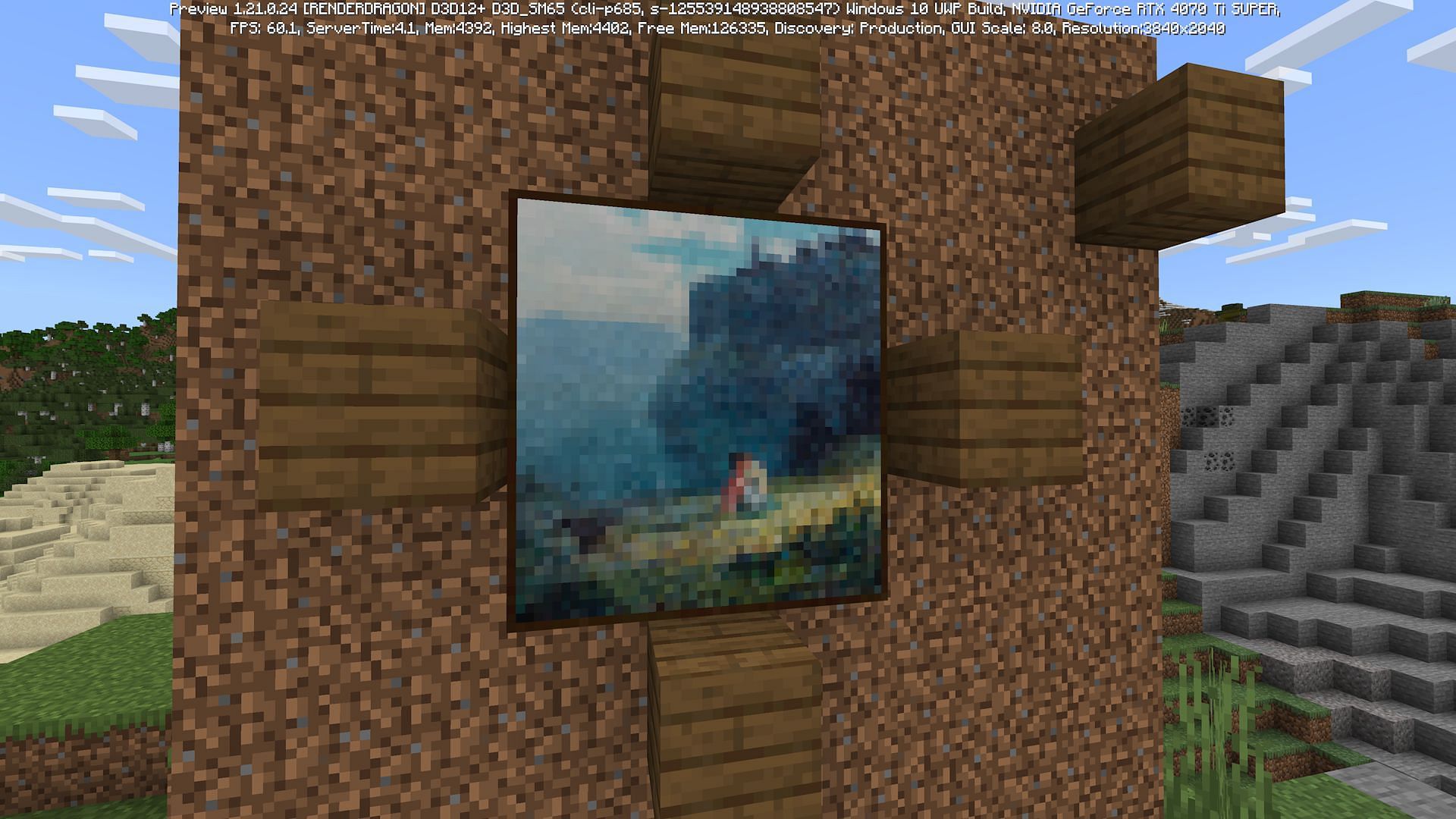 An example of guide blocks being used to place a 3x3 painting (Image via Mojang)