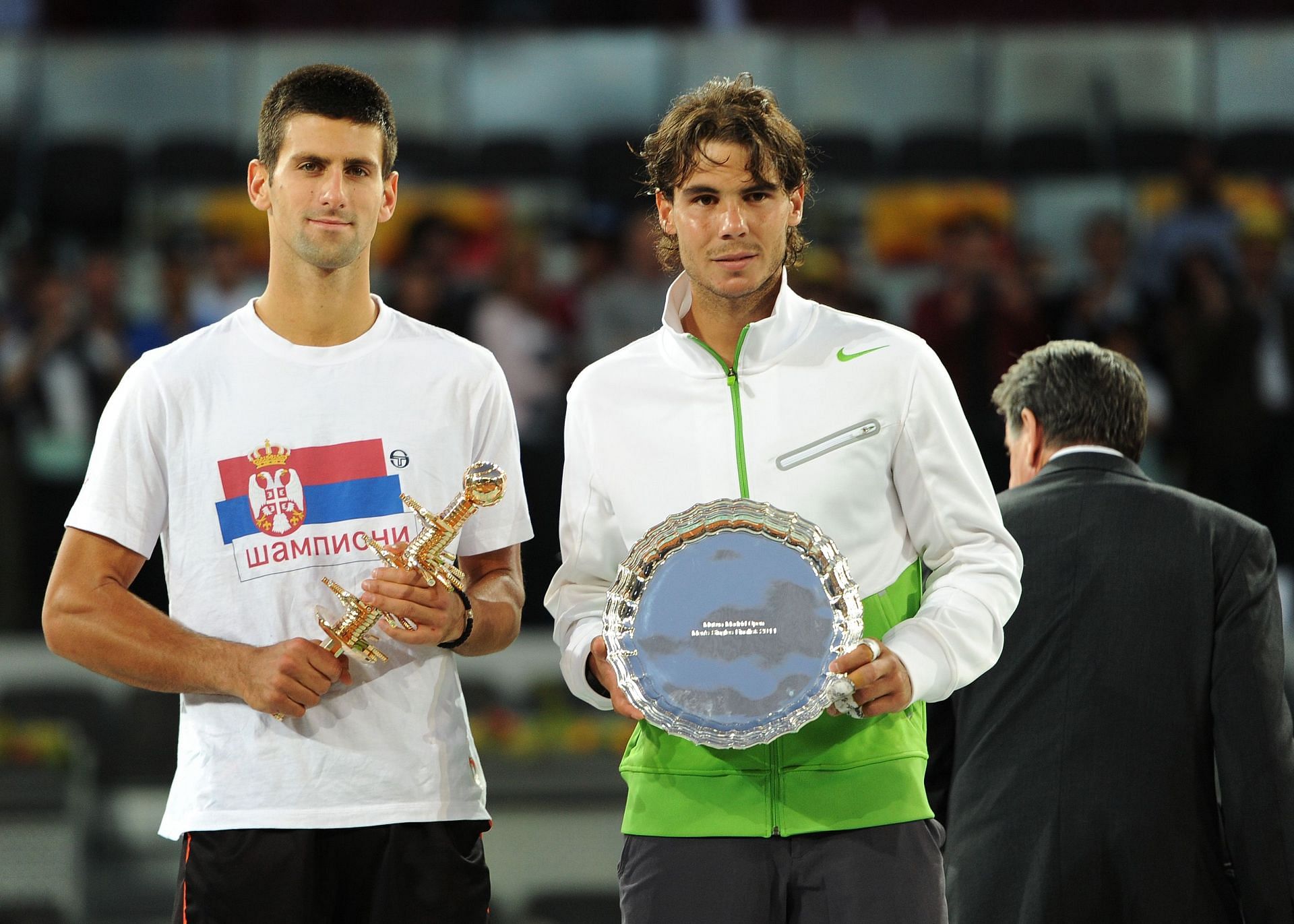 Novak Djokovic (left) and Rafael Nadal after the 2011 Madrid Open final