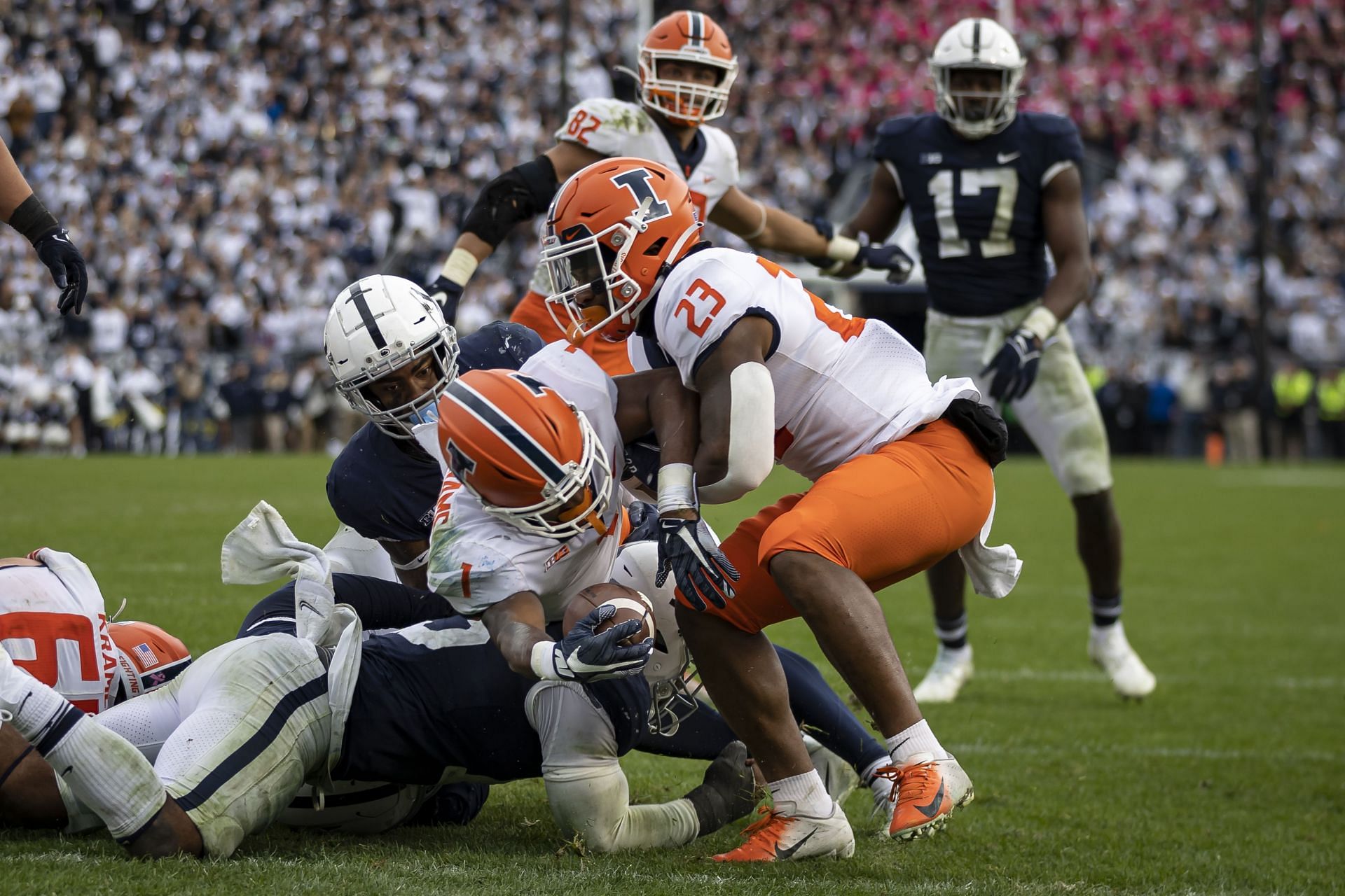 Isaiah Williams, #1 of the Illinois Fighting Illini, scores a two-point conversion