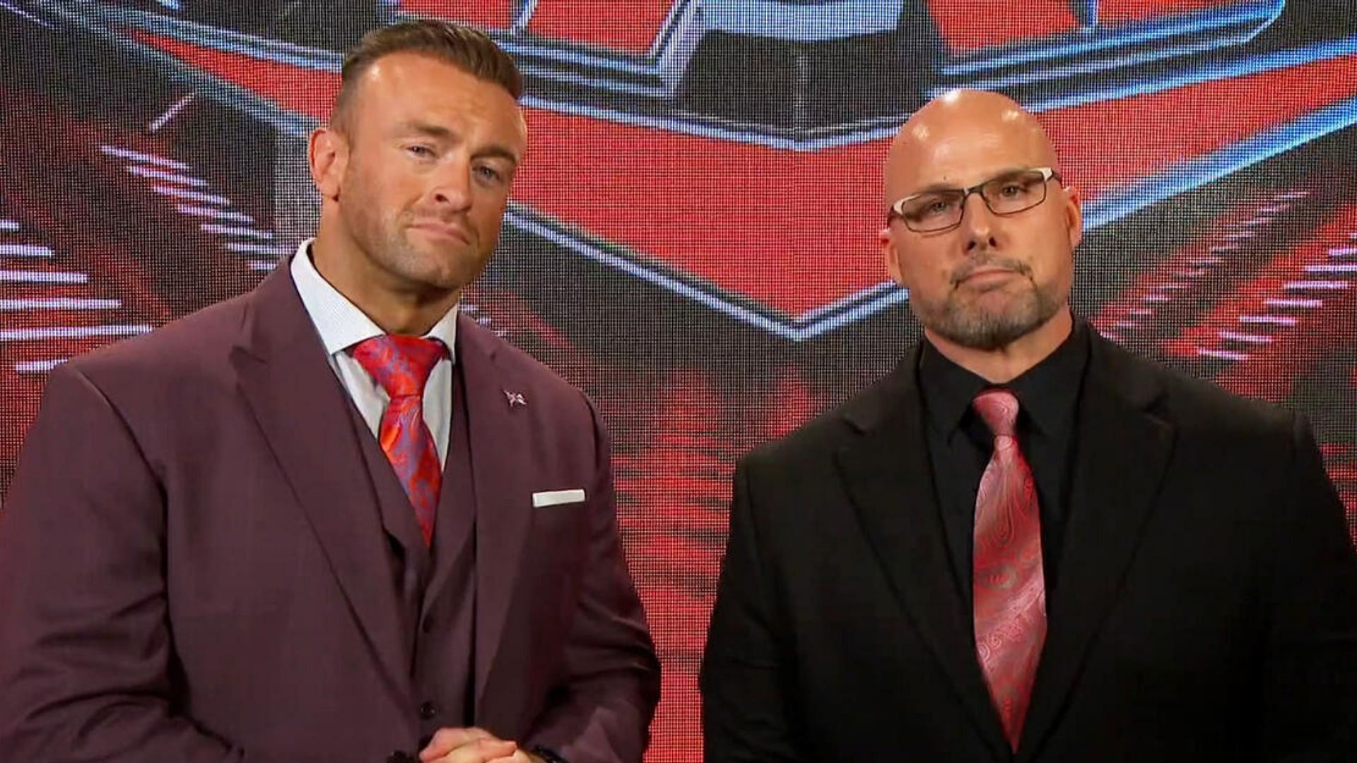 Nick Aldis (left) is the SmackDown GM, Pearce (right) is the RAW GM.