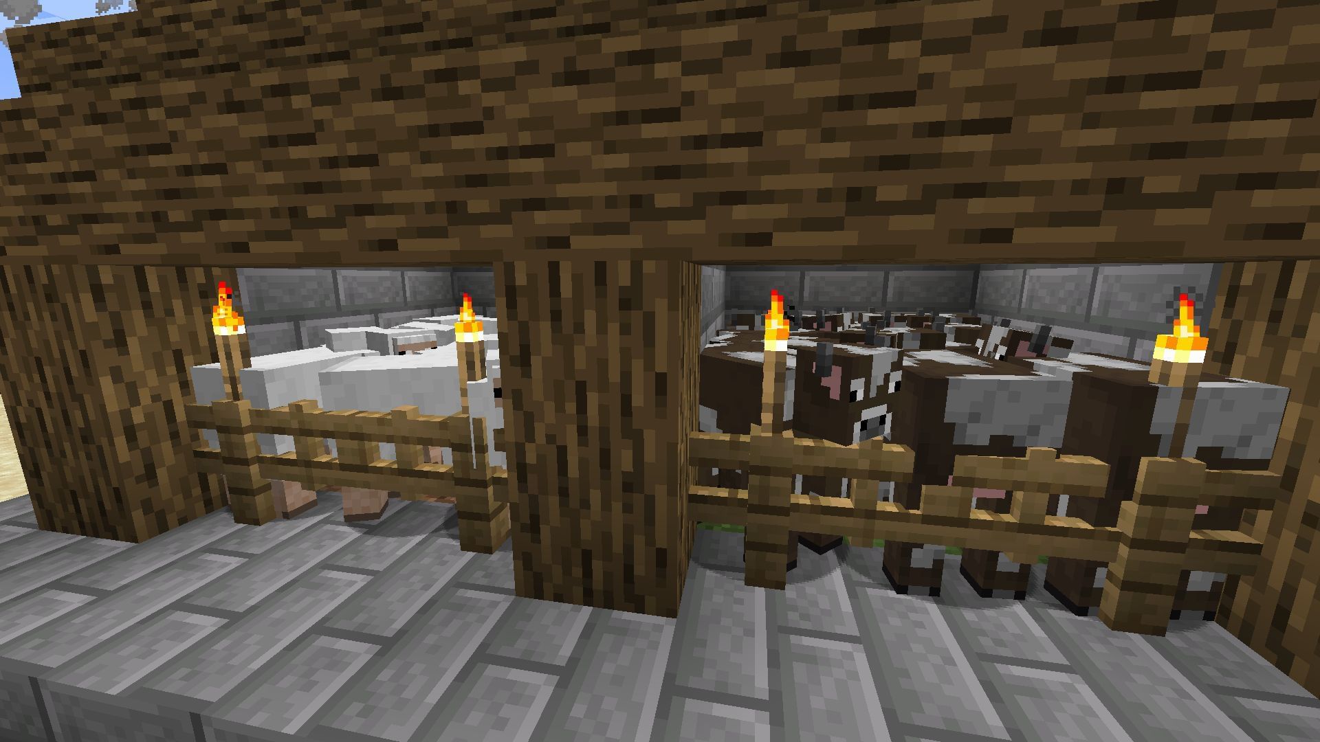 Two small animal pens (Image via Mojang)