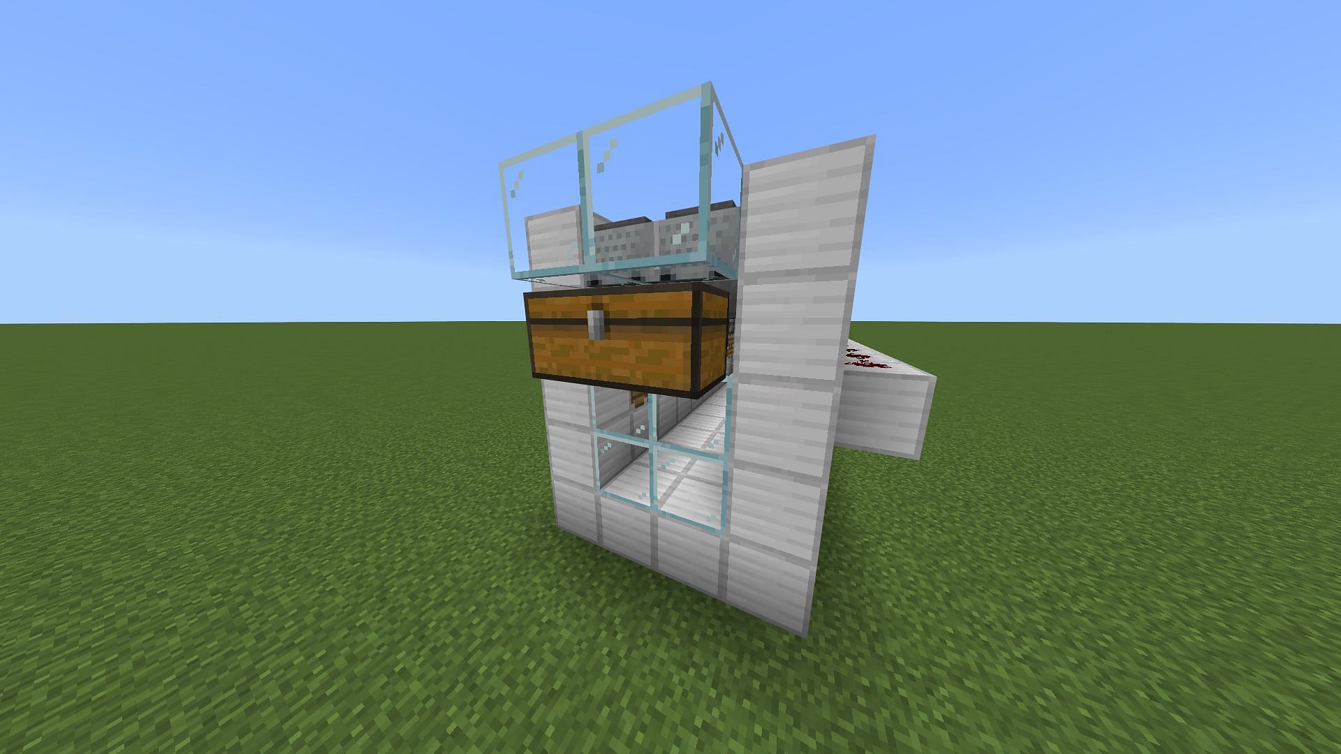 The chest placement with the hoppers and hopper minecarts behind it (Image via Mojang)