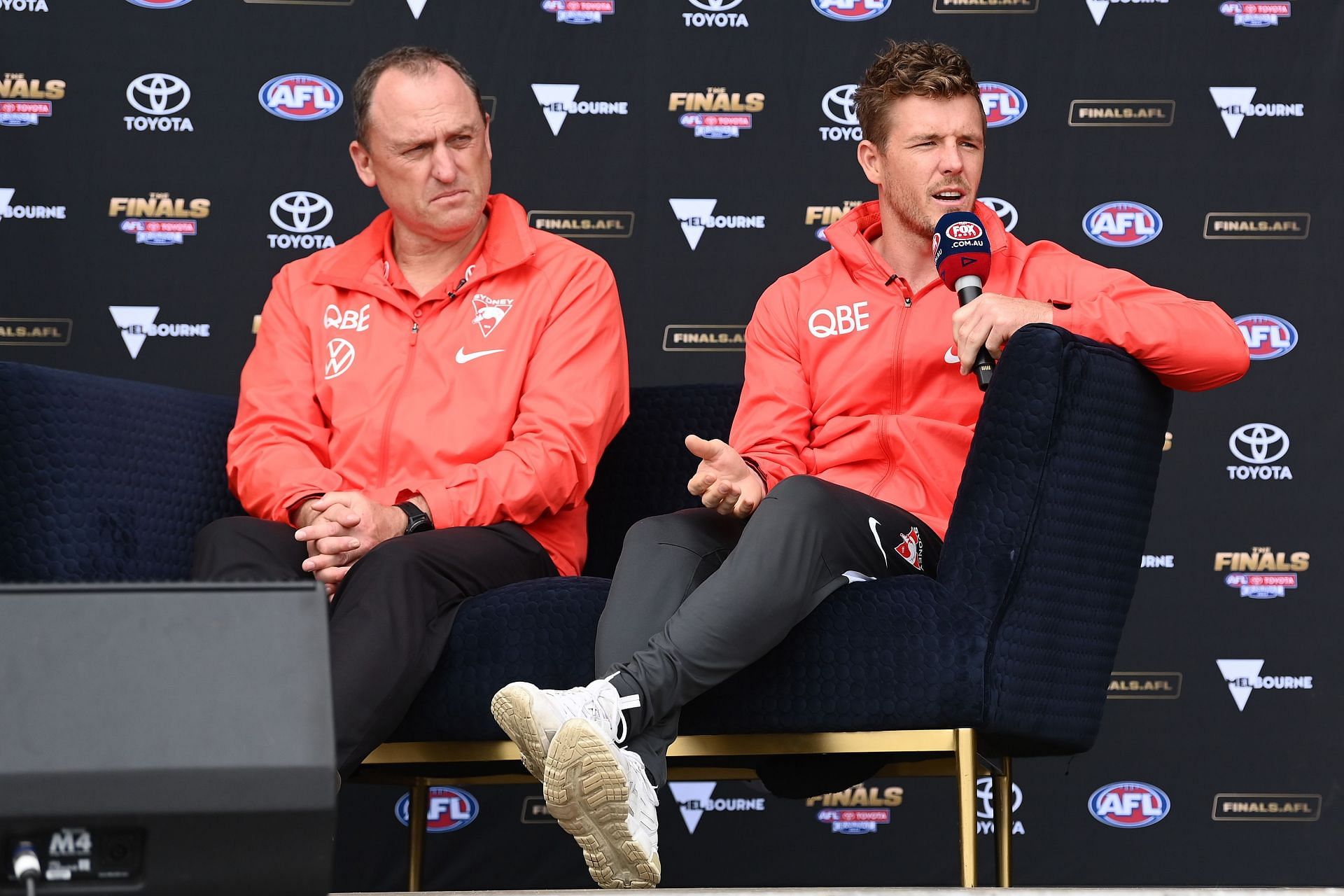 Sydney Swans coach John Longmire and captain Luke Parker speak at a press conference