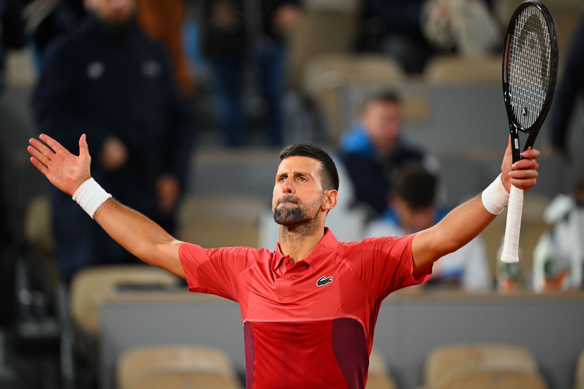 Novak Djokovic celebrates his first-round win at the 2024 French Open