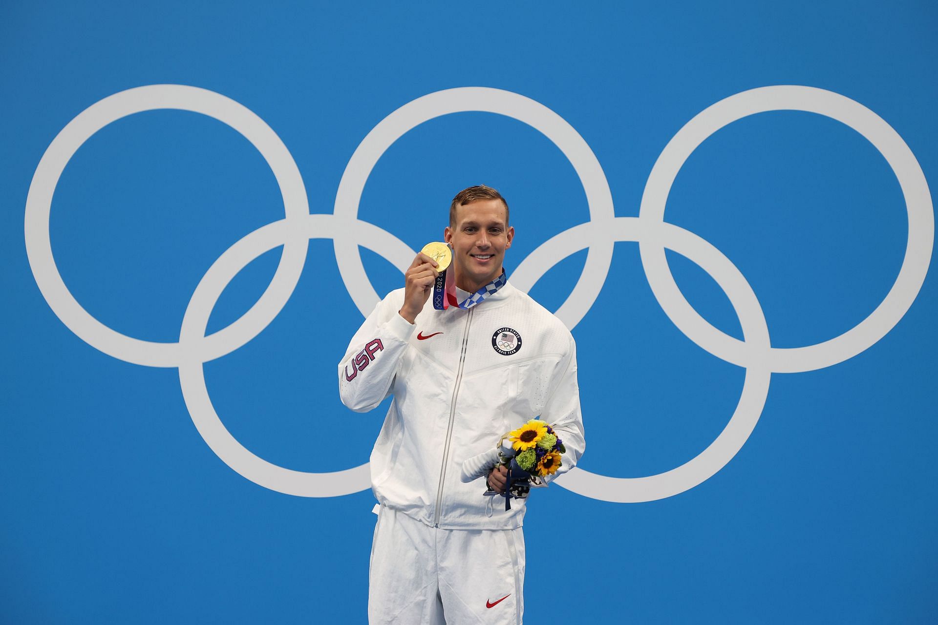 Gold medalist Caeleb Dressel of Team United States poses with the gold medal for the Men&#039;s 50m Freestyle on day nine of the Tokyo 2020 Olympic Games at Tokyo Aquatics Centre on August 01, 2021, in Tokyo, Japan. (Photo by Al Bello/Getty Images)