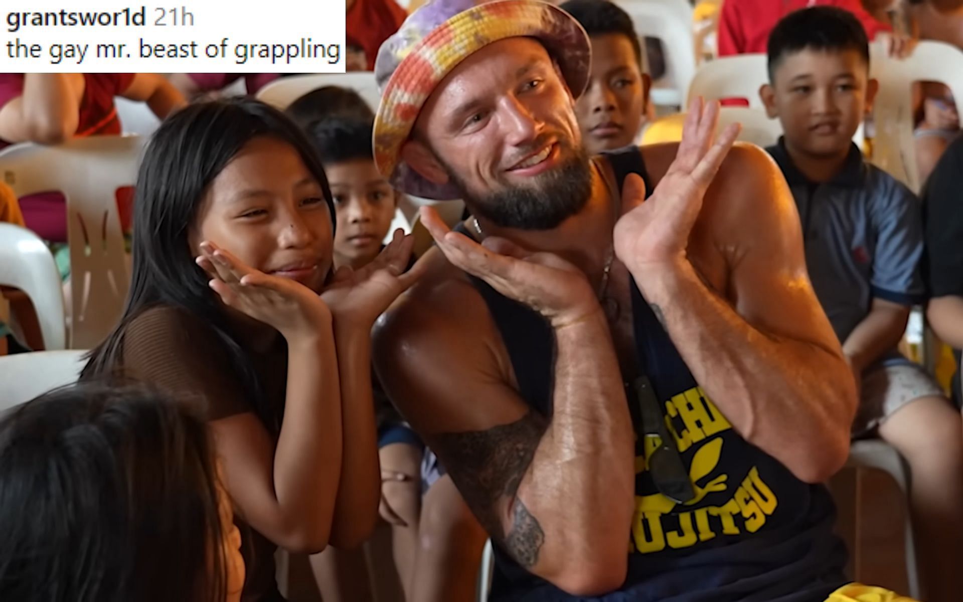 Craig Jones (right) in Manila, Philippines, feeding 600 children in the slums [Image Courtesy: @b-teamjiujitsu on YouTube]