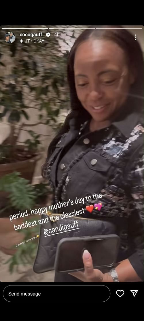 Coco Gauff's mother walking elegantly in a corridor