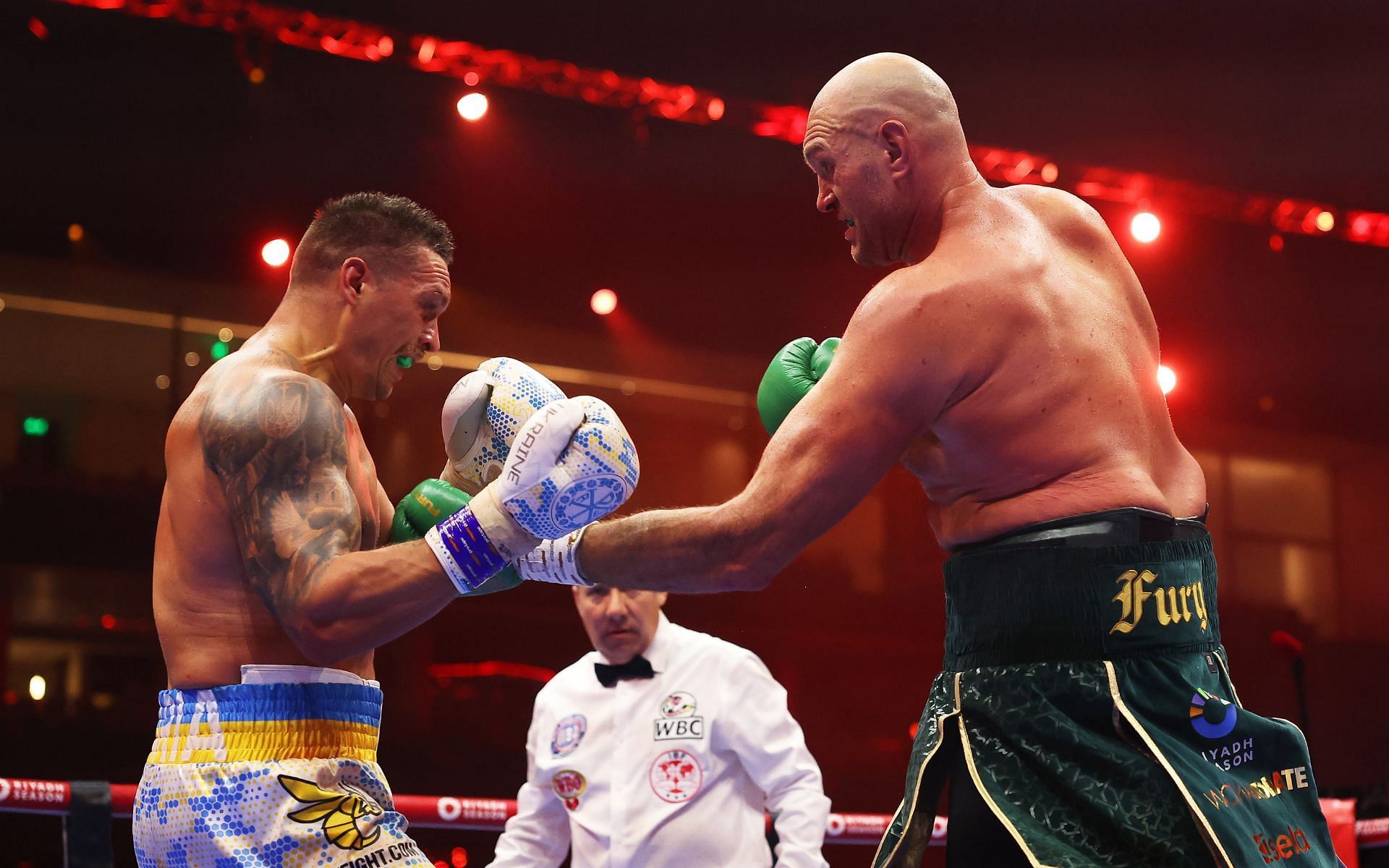 Oleksandr Usyk (left) bested Tyson Fury (right) on the judges