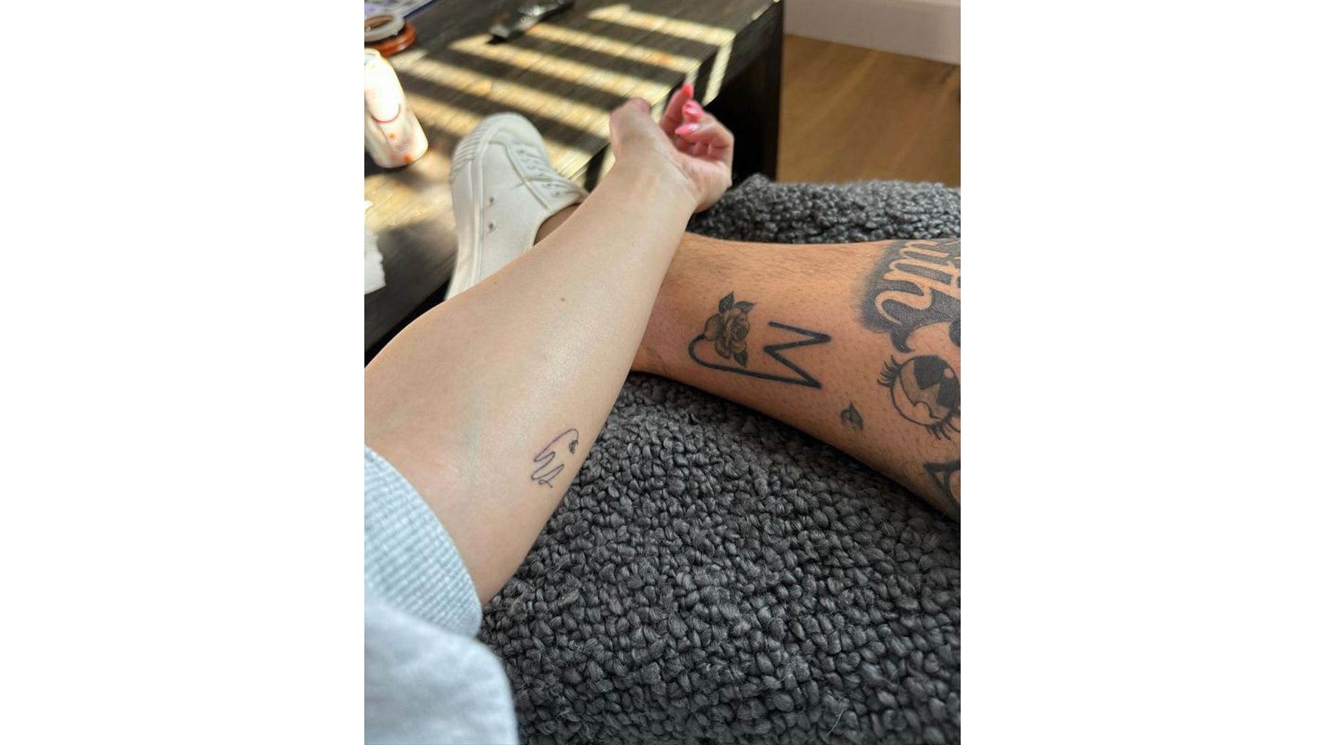 Dak Prescott and Sarah Jane show off their MJ tattoo (From: @srahjane official IG)