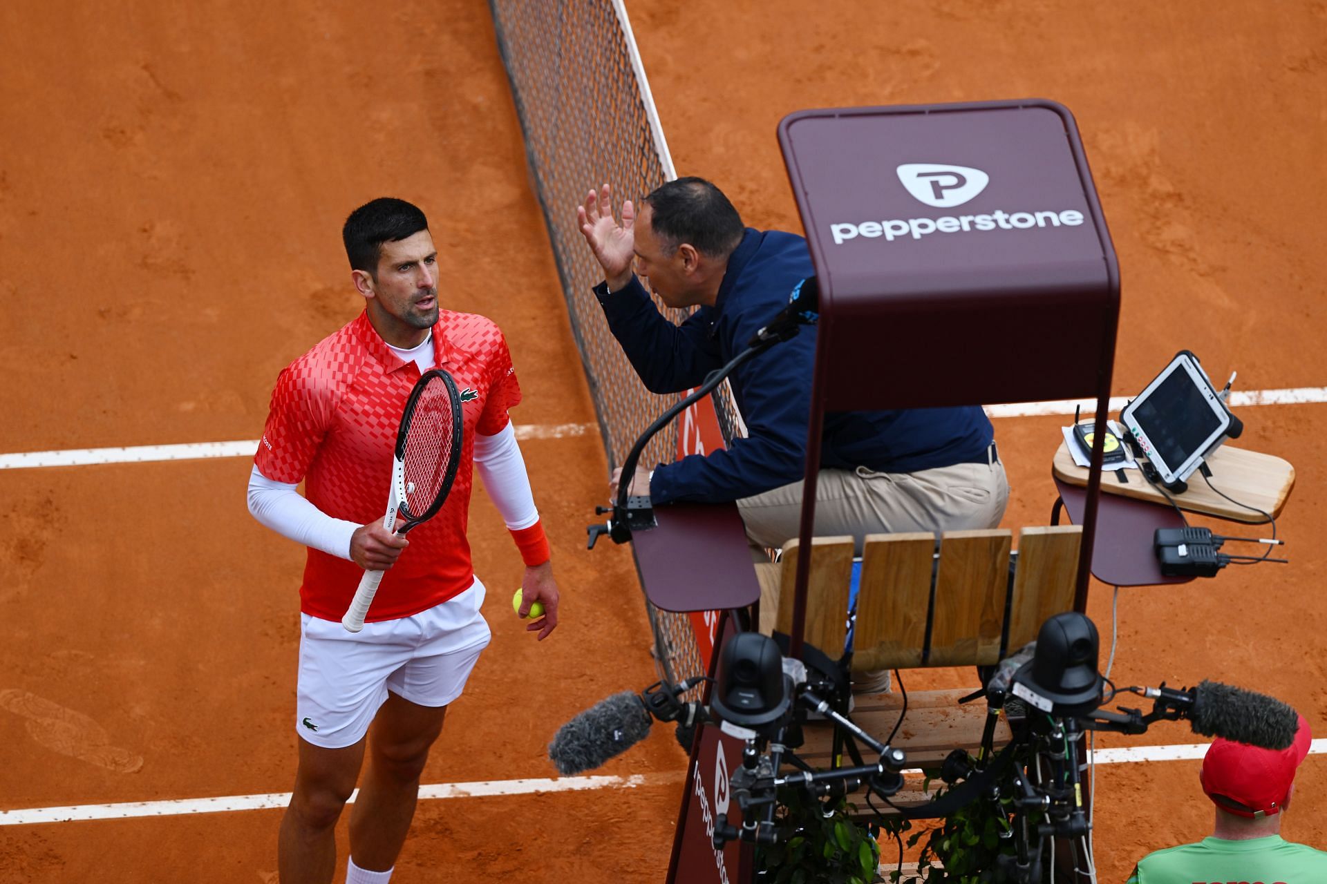 Novak Djokovic and Mohamed Lahyani at the Italian Open in 2023