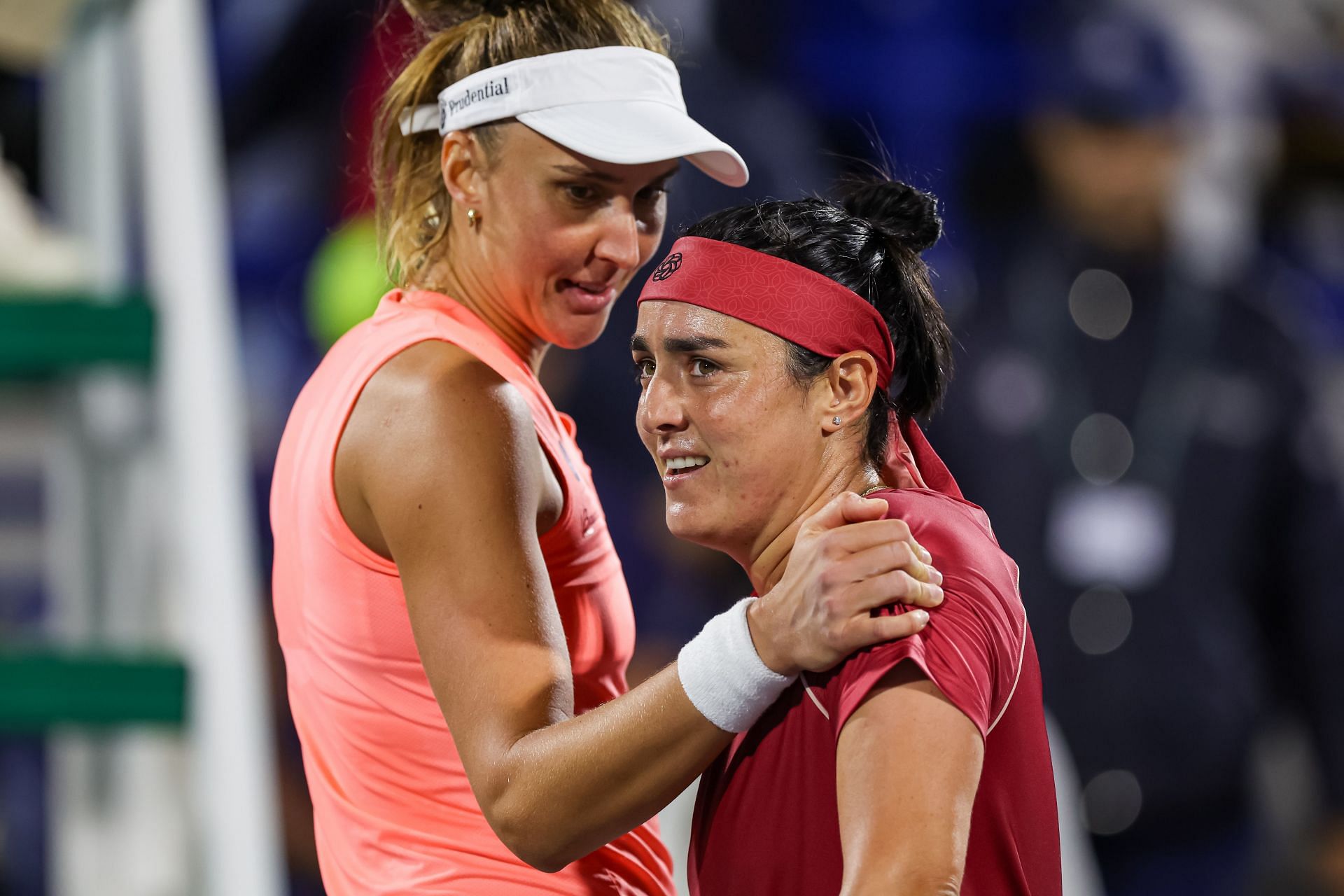 Beatriz Haddad Maia (L) consoling a dejected Ons Jabeur (R) at the 2024 Abu Dhabi Open