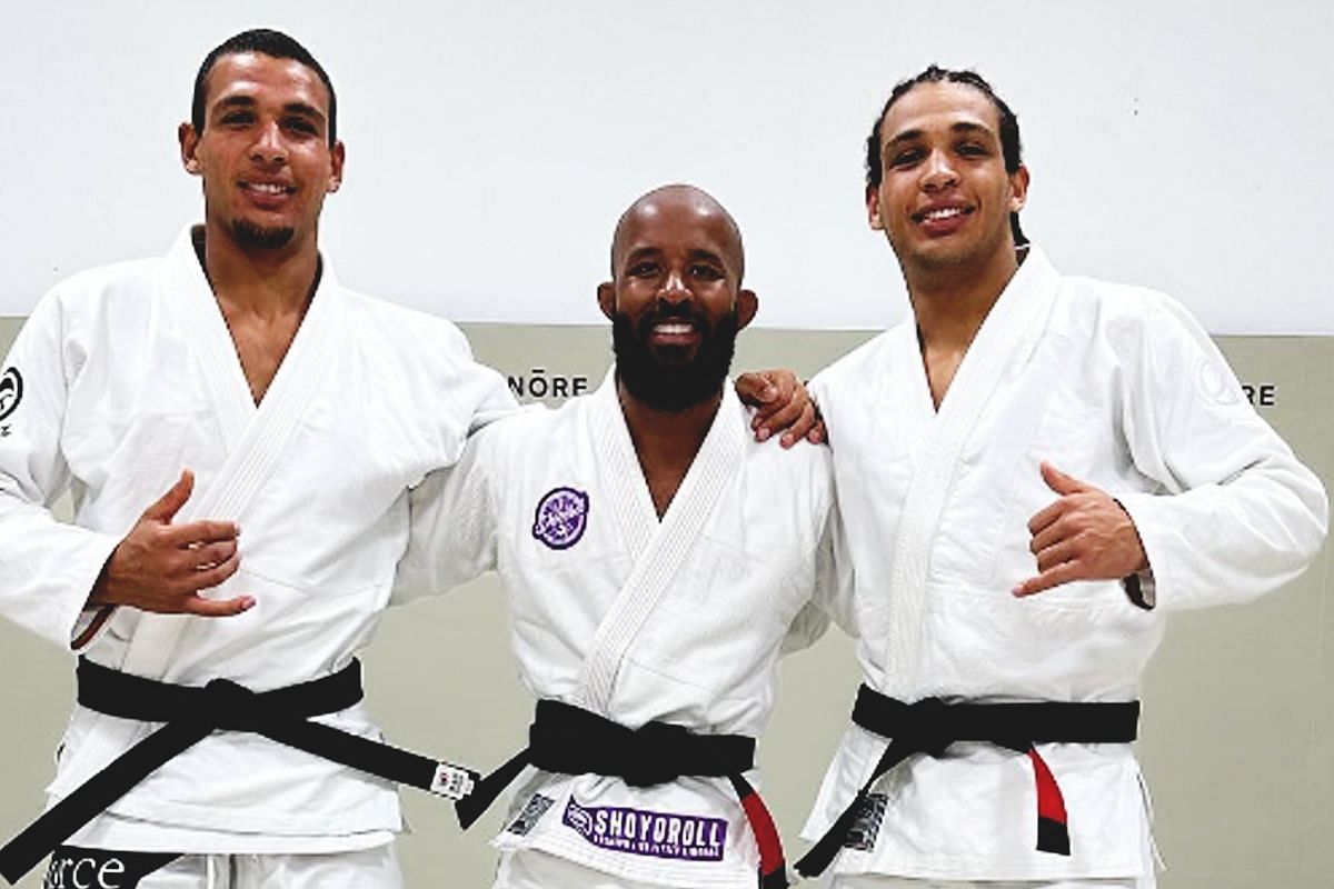 Demetrious Johnson with the Ruotolo twins