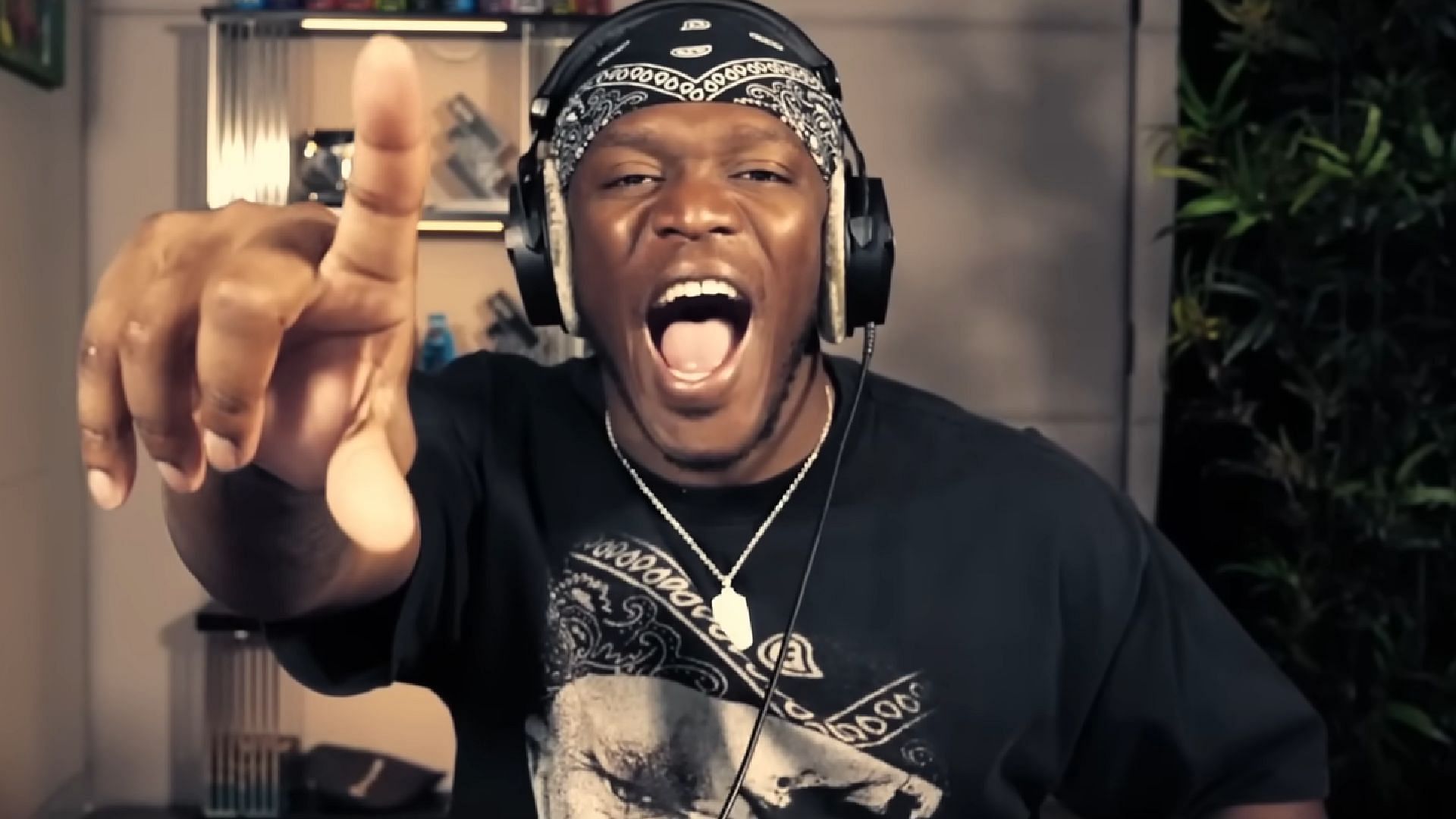 KSI reacts to his main channel getting eclipsed by IShowSpeed (Image via JJ Olatunji/YouTube)