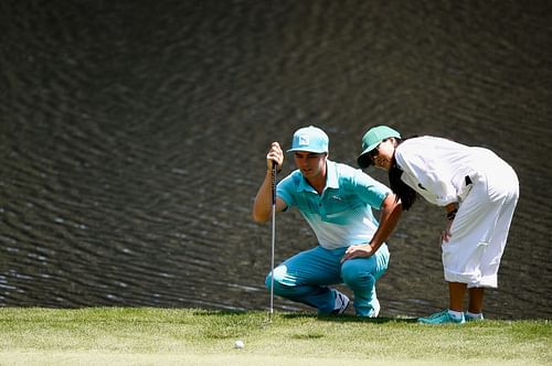 Rickie Fowler with his mother at The Masters (Images via Getty)