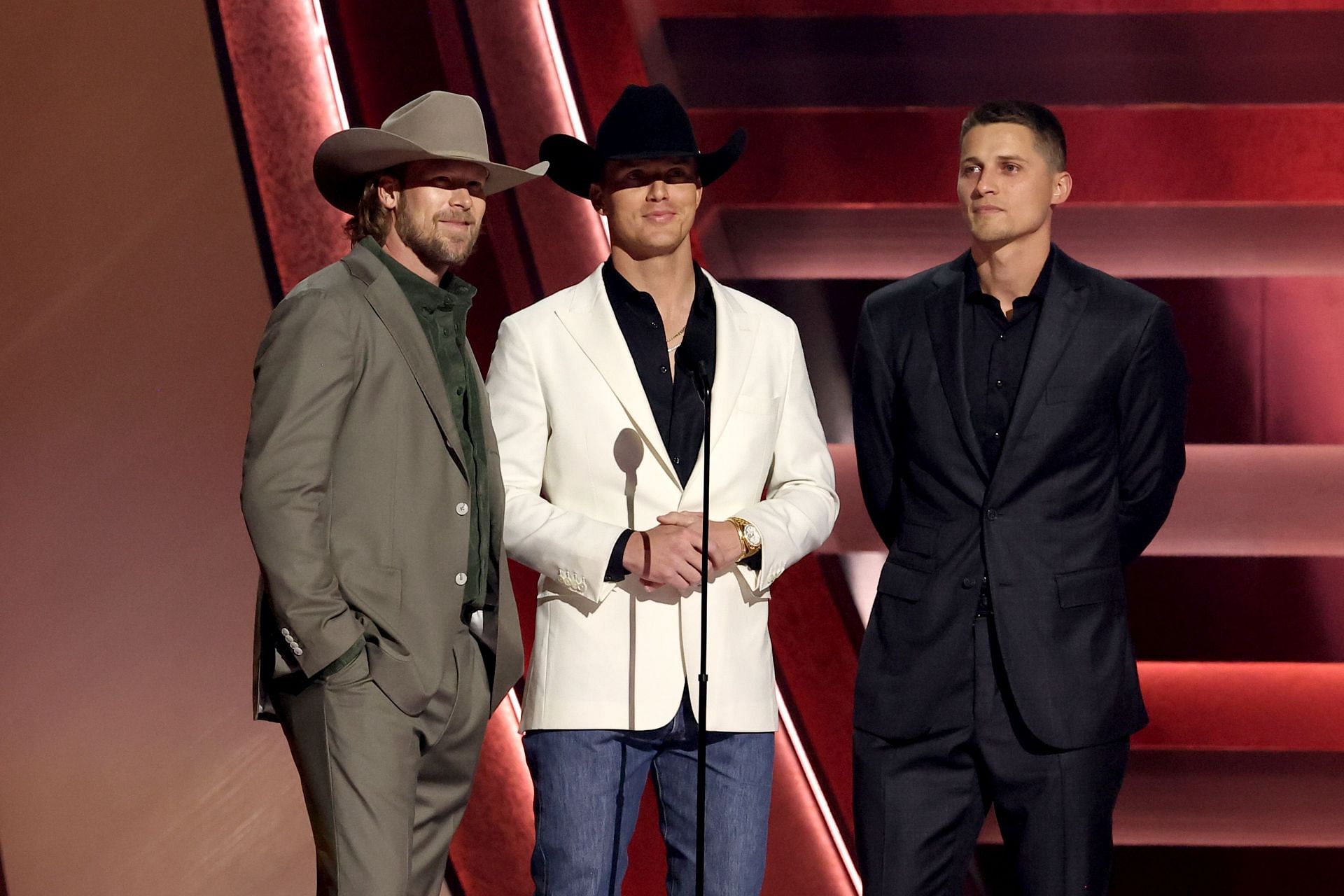 Brian Kelley, Parker McCollum and Corey Seager speak onstage during the 57th Annual CMA Awards at Bridgestone Arena on November 08, 2023