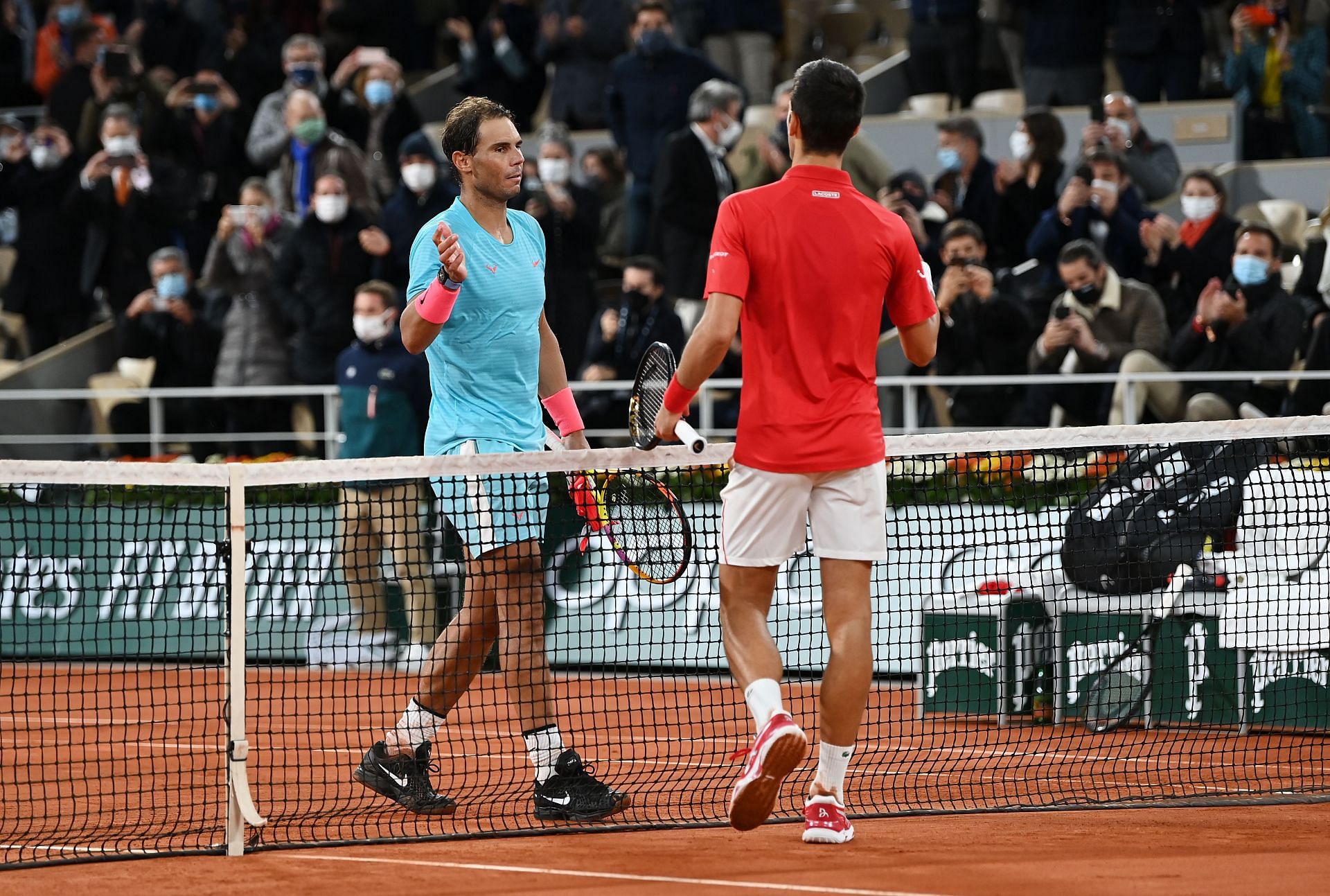 Rafael Nadal (L) and Novak Djokovic pictured at the 2020 French Open