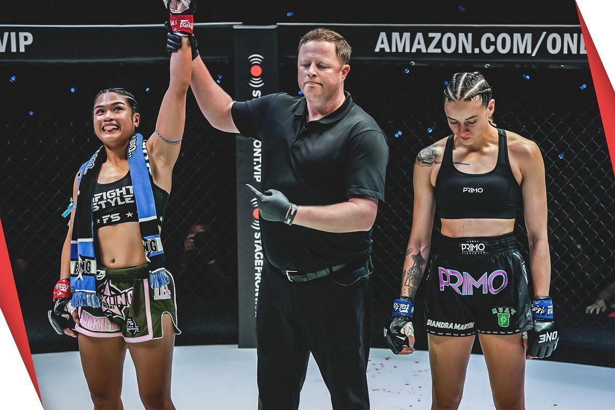 Jackie Buntan with her arm raised in victory [Photo via: ONE Championship]