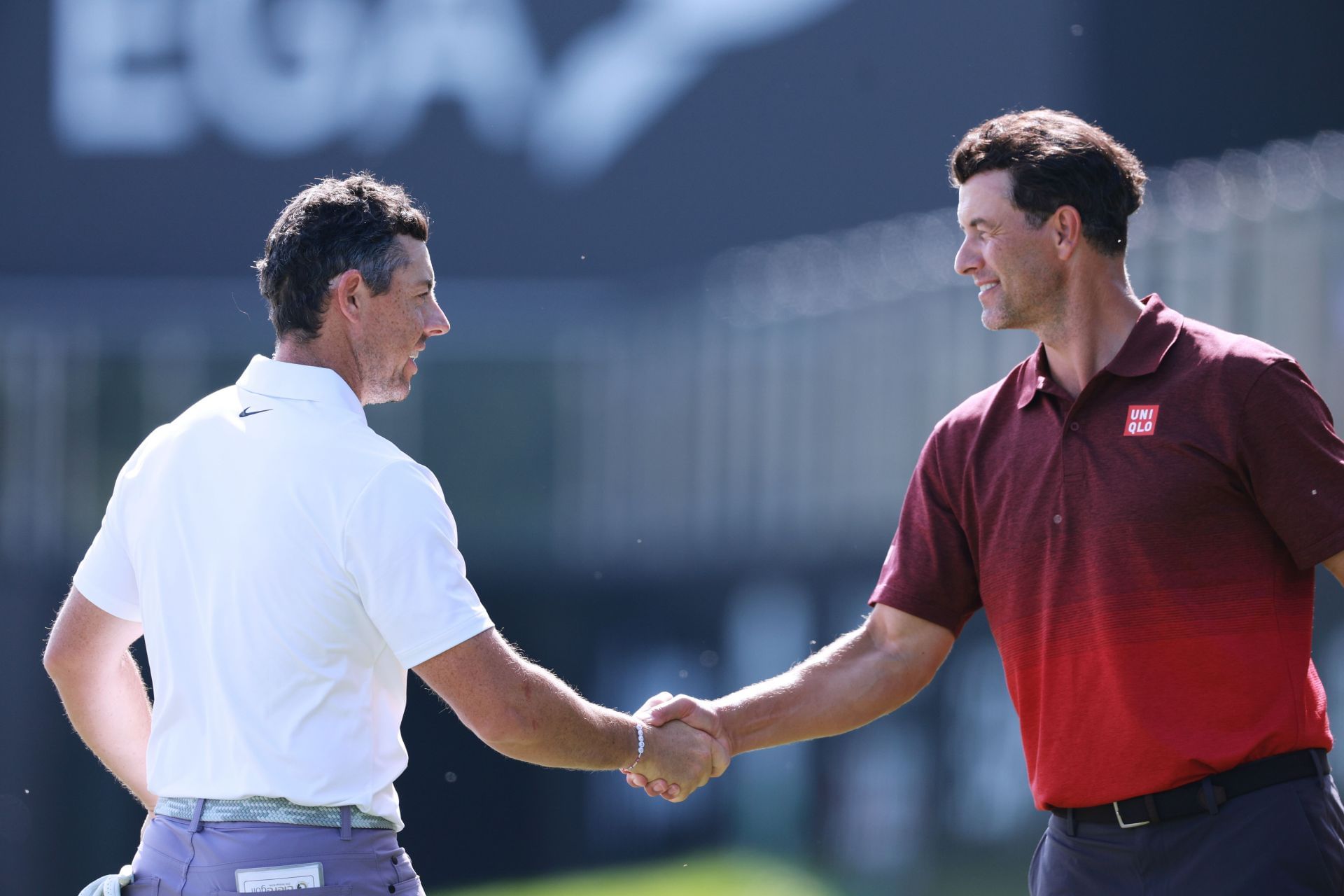 Rory McIlroy and Adam Scott (Image via Getty).