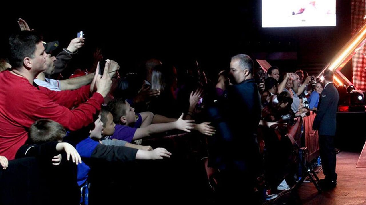 Fans at a WWE live event (via WWE