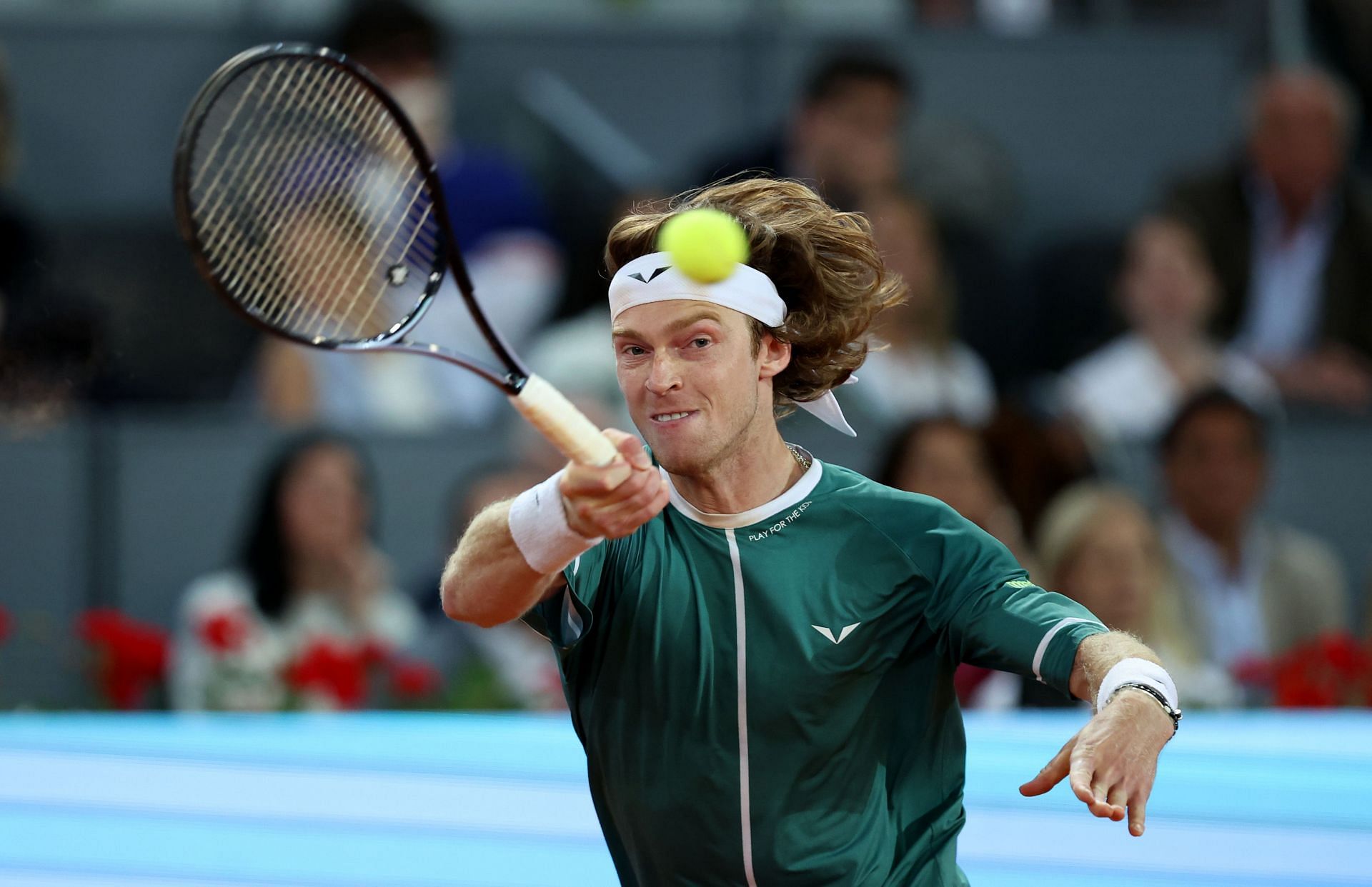 Andrey Rublev in action at the 2024 Madrid Open men&#039;s singles final