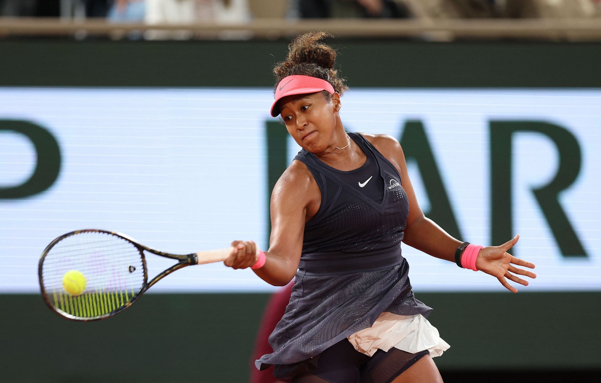 Naomi Osaka hits a forehand during French Open 2024. GETTY