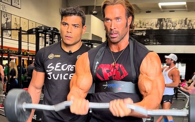 Bodybuilder Mike O'Hearn reacts to Paulo Costa throwing first pitch at the Mets game