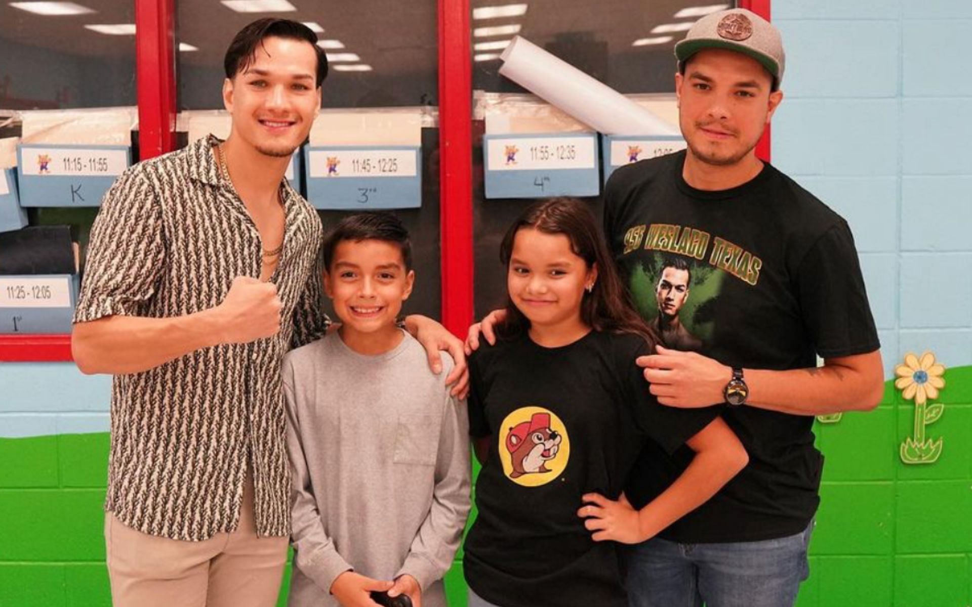 Brandon Figueroa (far left) and his older brother, Omar (far right) [Photo Courtesy @brandonfigueroa101 on Instagram]