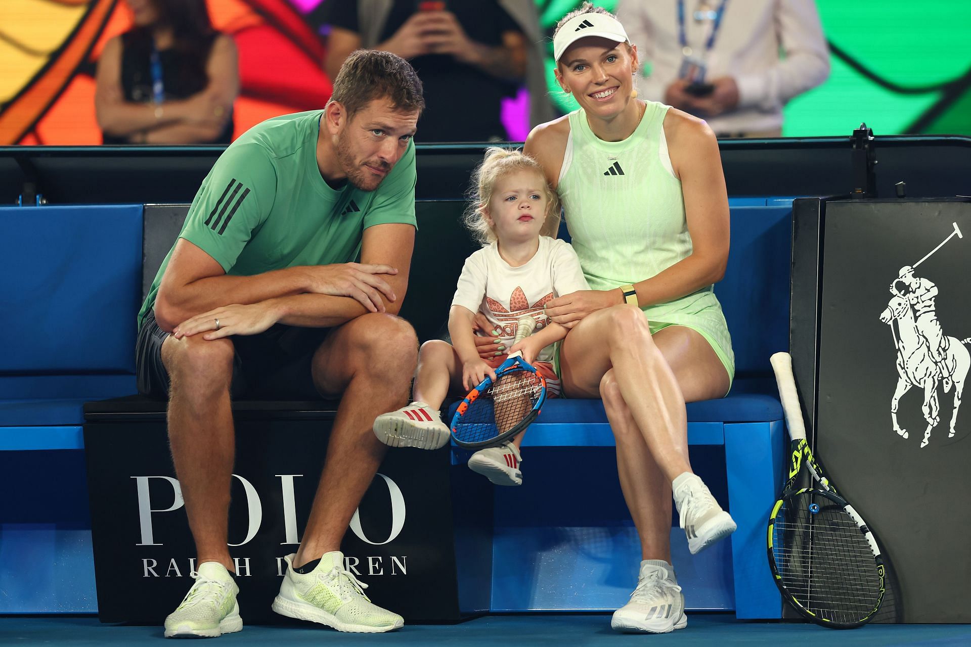 The Dane pictured with husband and daughter during Kids Tennis Day at 2024 Australian Open