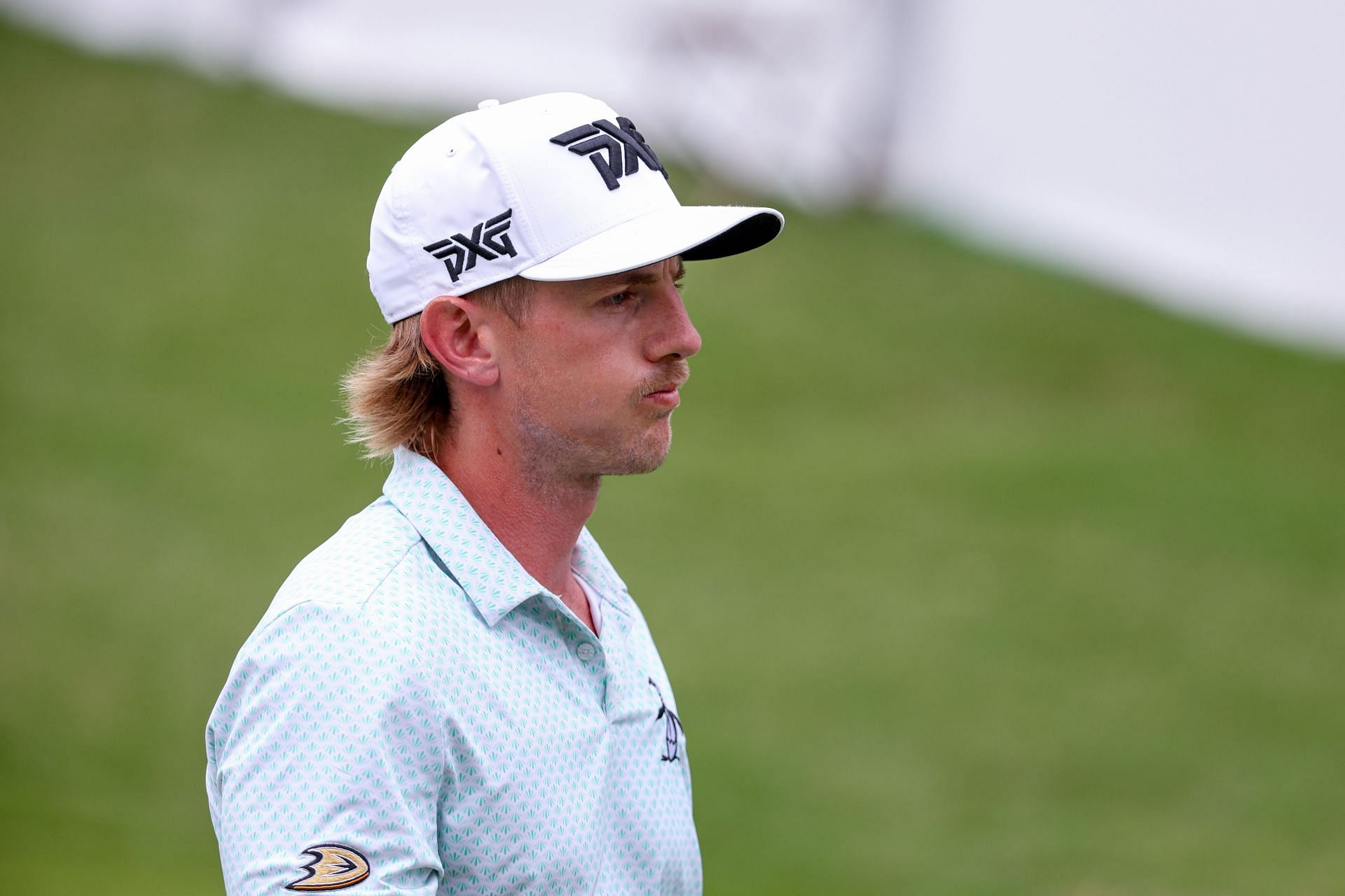 Jake Knapp walks off the 17th hole green during the third round of the CJ Cup Byron Nelson