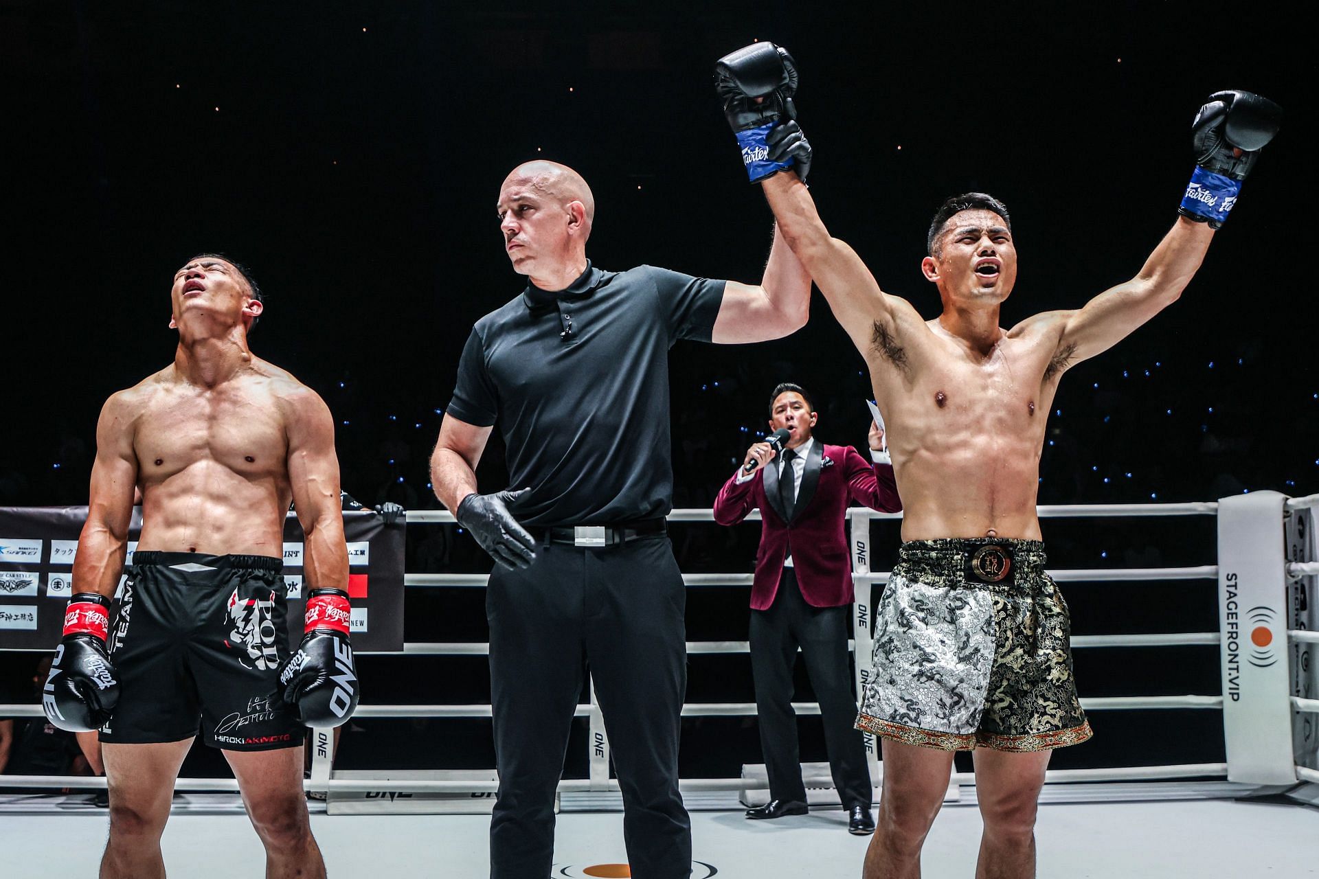 Wei Rui celebrates after defeating Hiroki Akimoto at ONE Fight Night 22 in Bangkok.