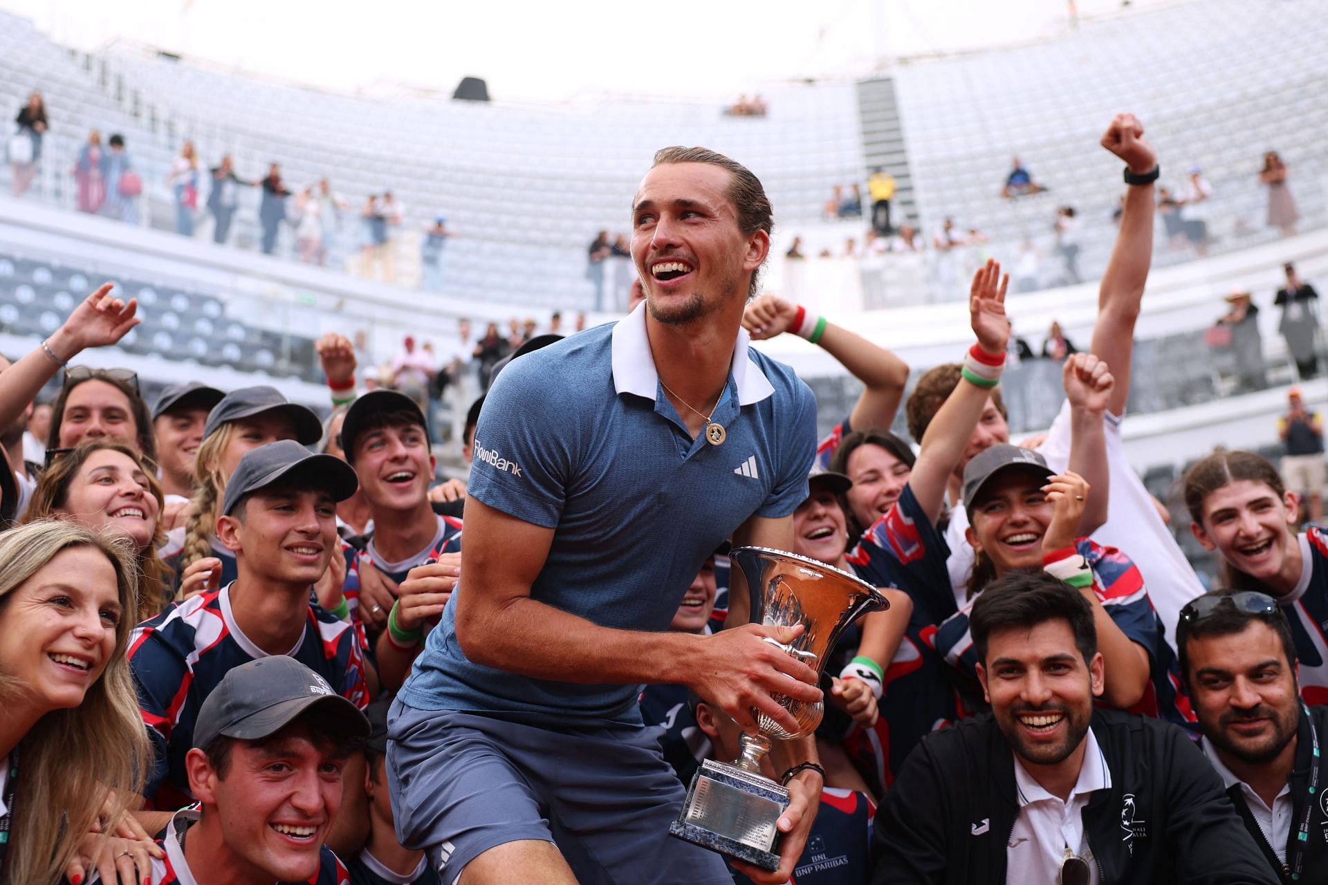 Alexander Zverev celebrates with Italian Open staff.