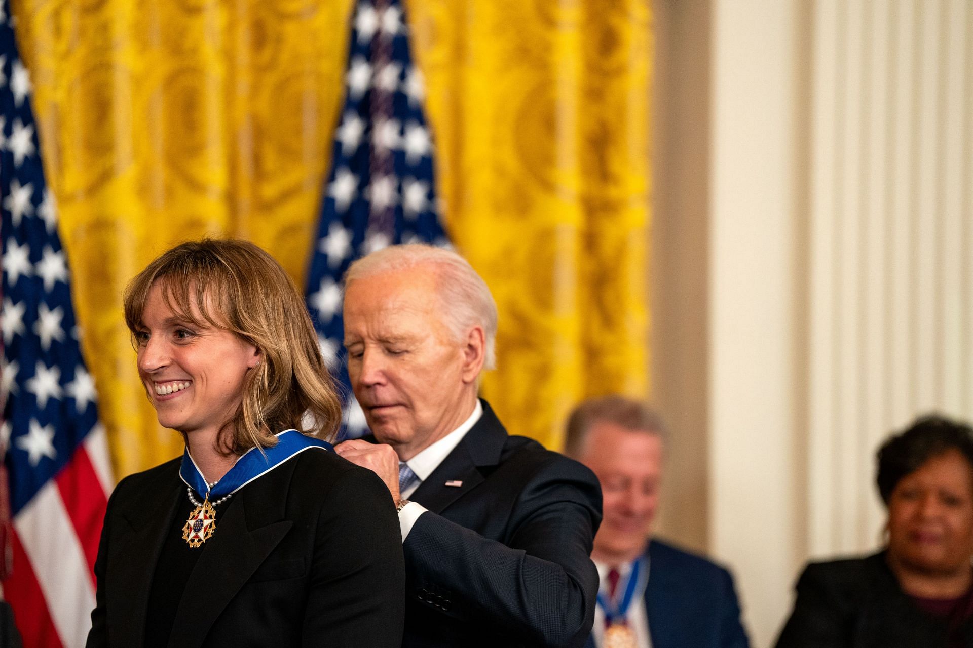 U.S. President Joe Biden presents the Presidential Medal of Freedom to Katie Ledecky during a ceremony in the East Room of the White House on May 3, 2024, in Washington, DC.