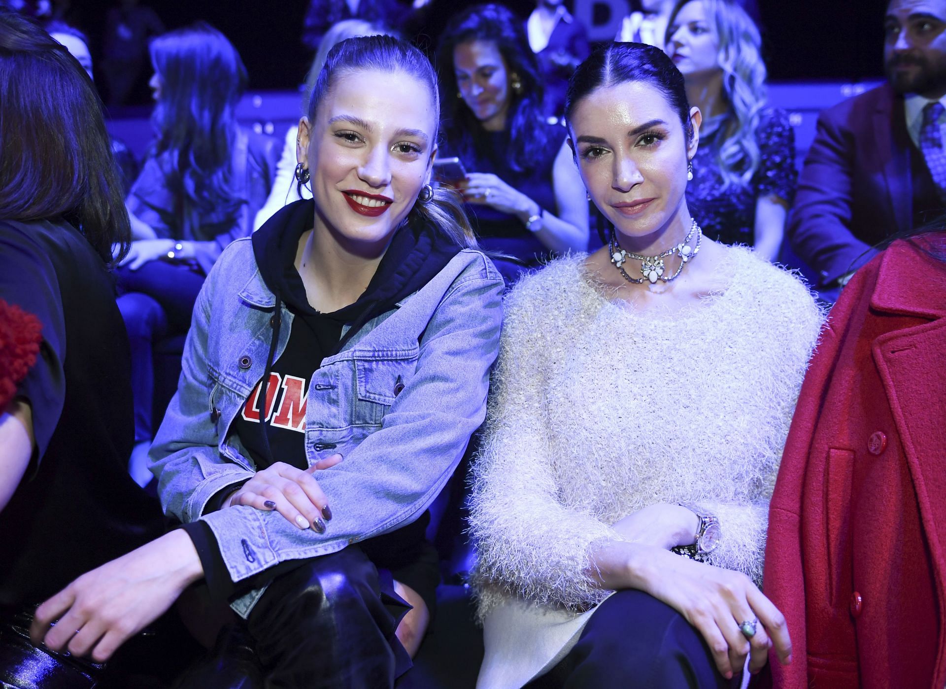 Serenay Sarikaya (left) at the Mercedes-Benz Fashion Week Istanbul (Image via Getty/Levent Kulu)