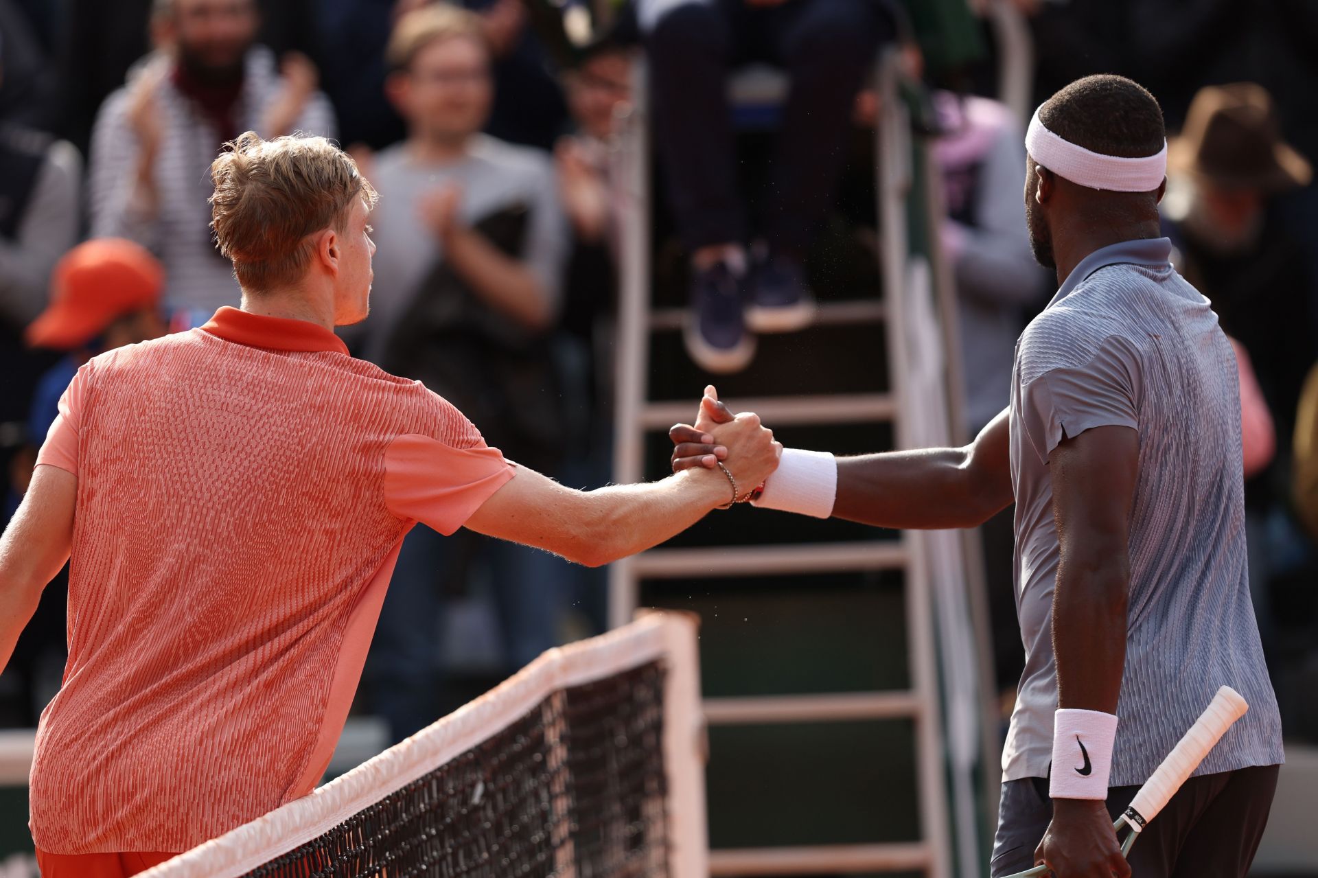 Denis Shapovalov and Frances Tiafoe shake hands after 2024 French Open 2R clash