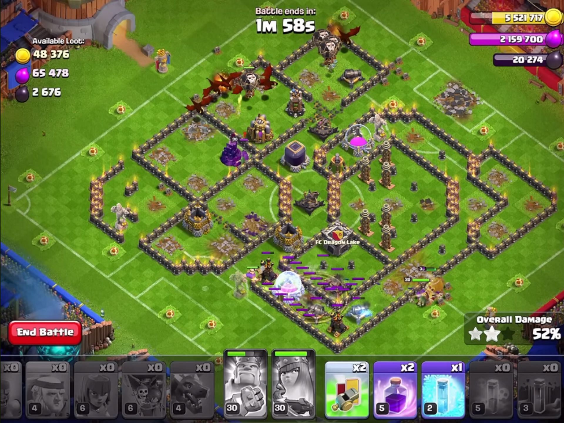 Balloons and Dragons destroying the base (Image via Supercell)